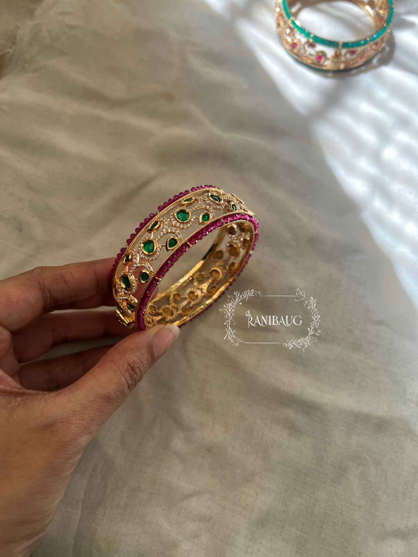 Arna Gold Plated Pink And Green Bangle For Lehenga By Ranibaug