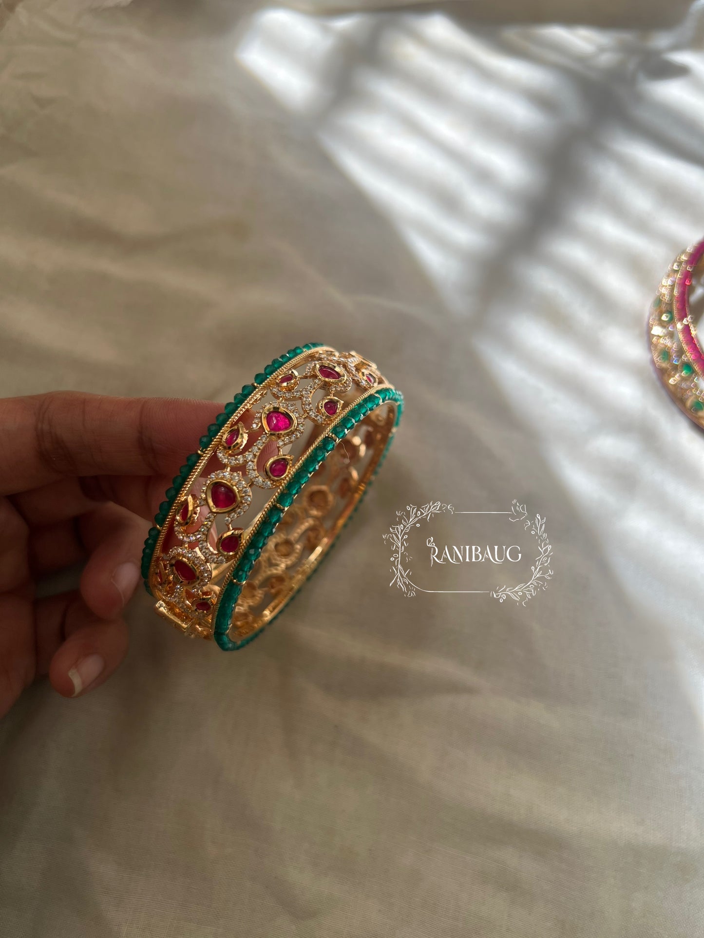 Arna Gold Plated Pink And Green Bangle For Lehenga By Ranibaug