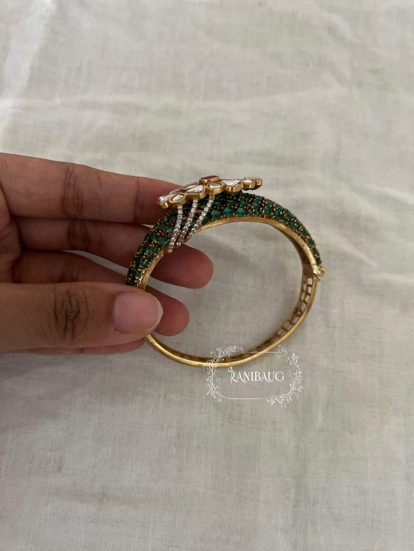 Arohi Polki Gemstone Gold Finish Emerald Ruby Accent Bracelet By Ranibaug