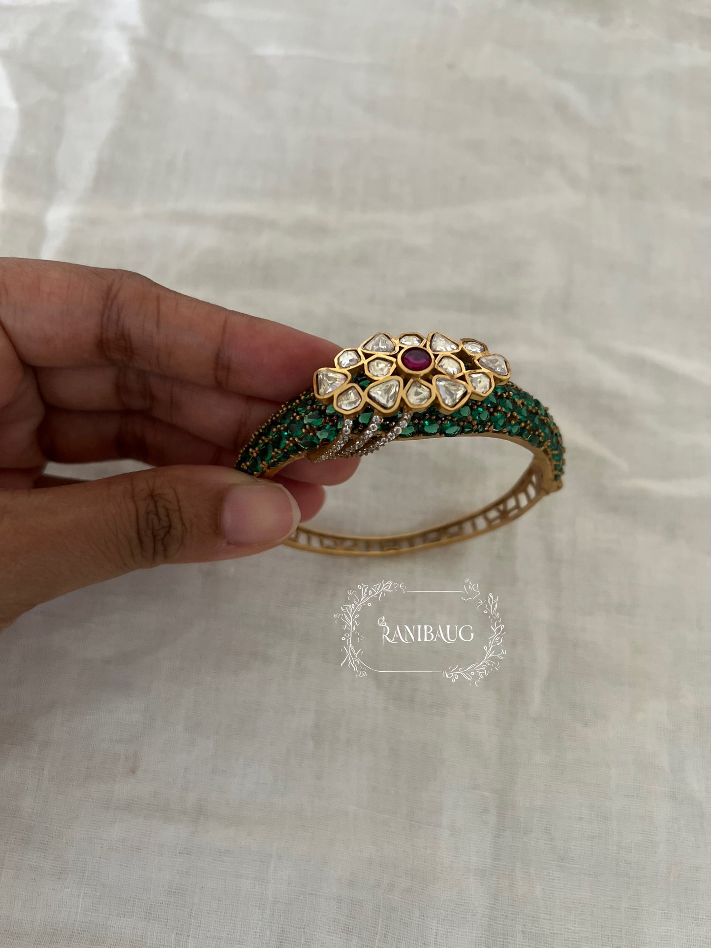 Arohi Polki Gemstone Gold Finish Emerald Ruby Accent Bracelet By Ranibaug