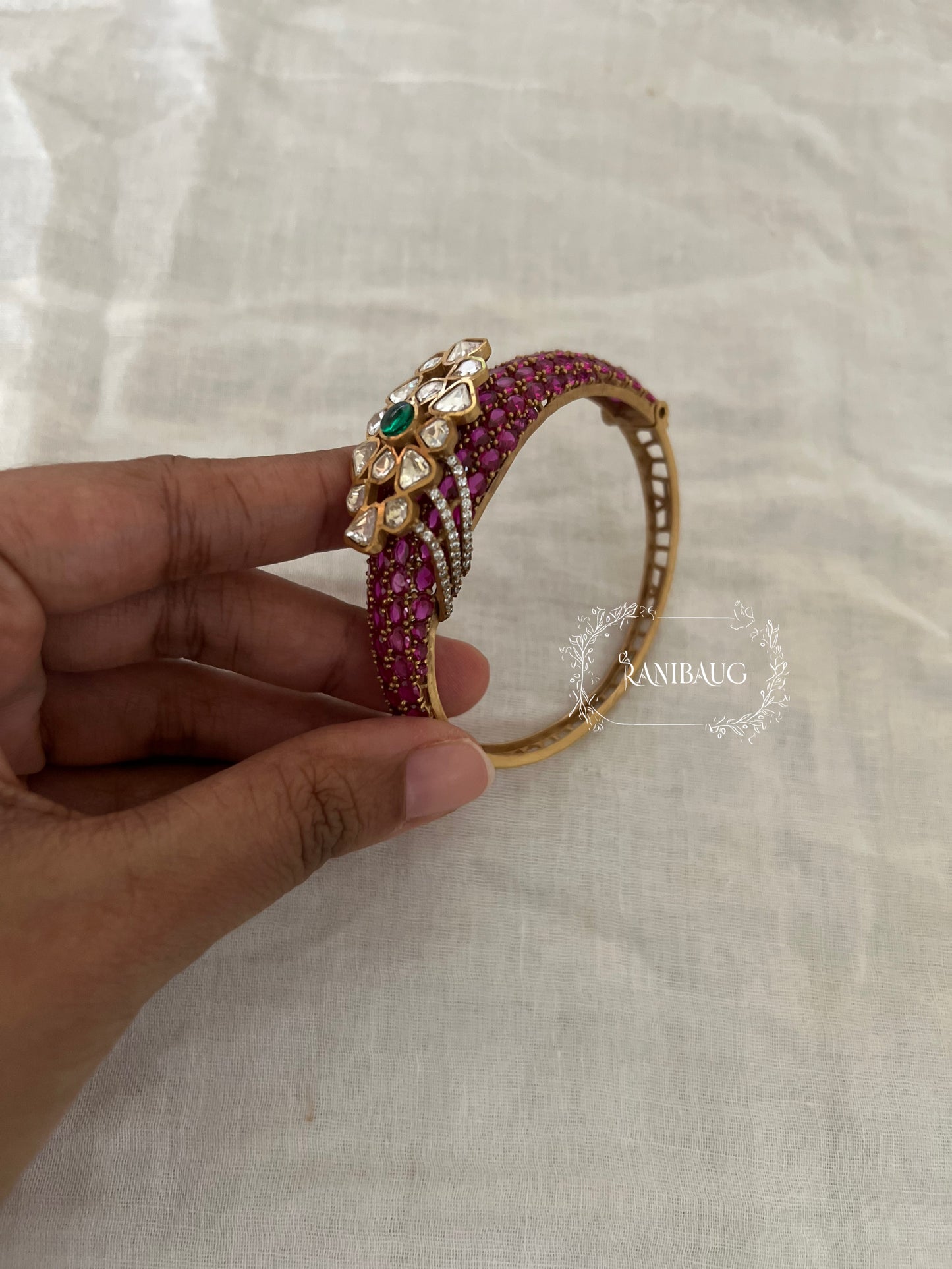 Arohi Polki Gemstone Gold Finish Emerald Ruby Accent Bracelet By Ranibaug