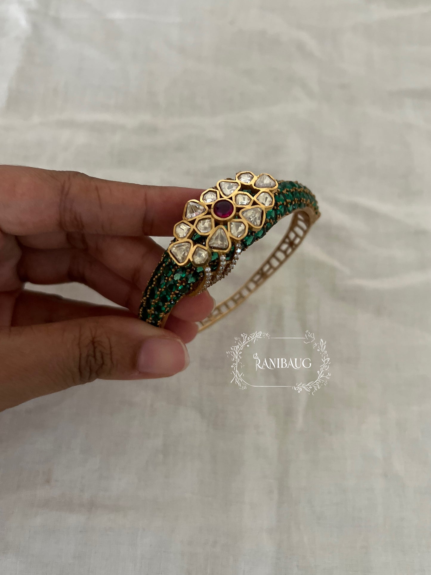 Arohi Polki Gemstone Gold Finish Emerald Ruby Accent Bracelet By Ranibaug