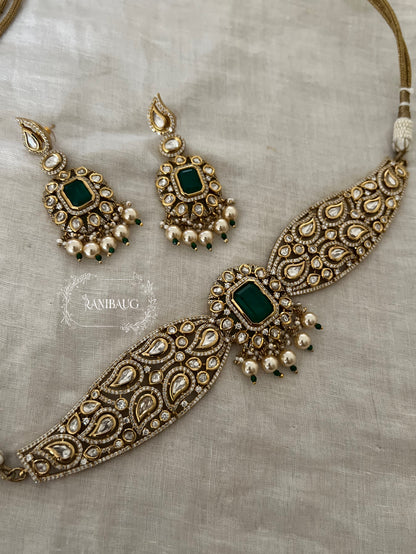 Ashika Emerald Teardrop Polki Motif And Pearl Adorned Royal Neck Choker Jewellery Set By Ranibaug | The Royal Wedding Collection 2026