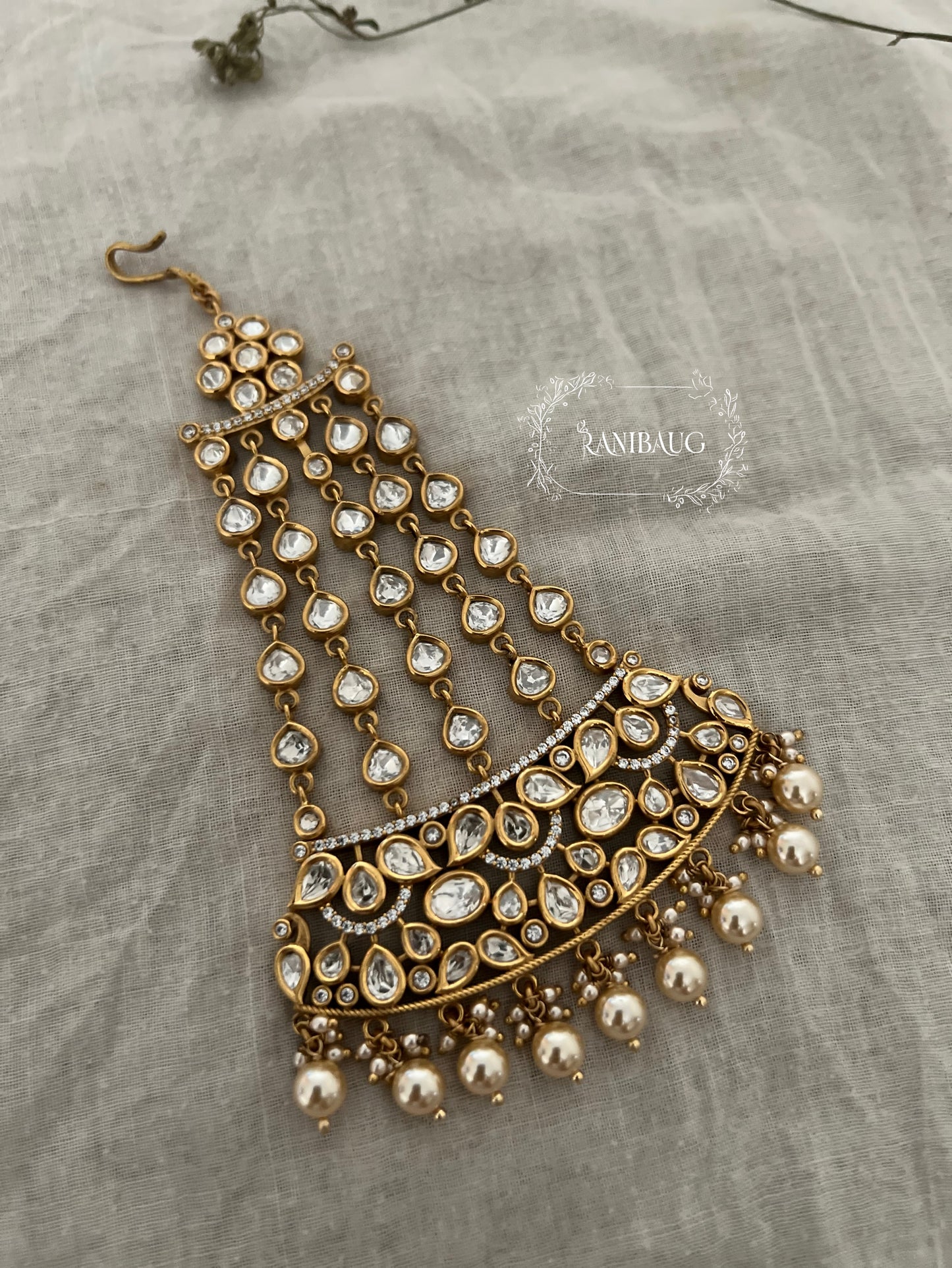 Ashwini Gld Plated Kundan Studded Bridal Passa With Pearls By Ranibaug