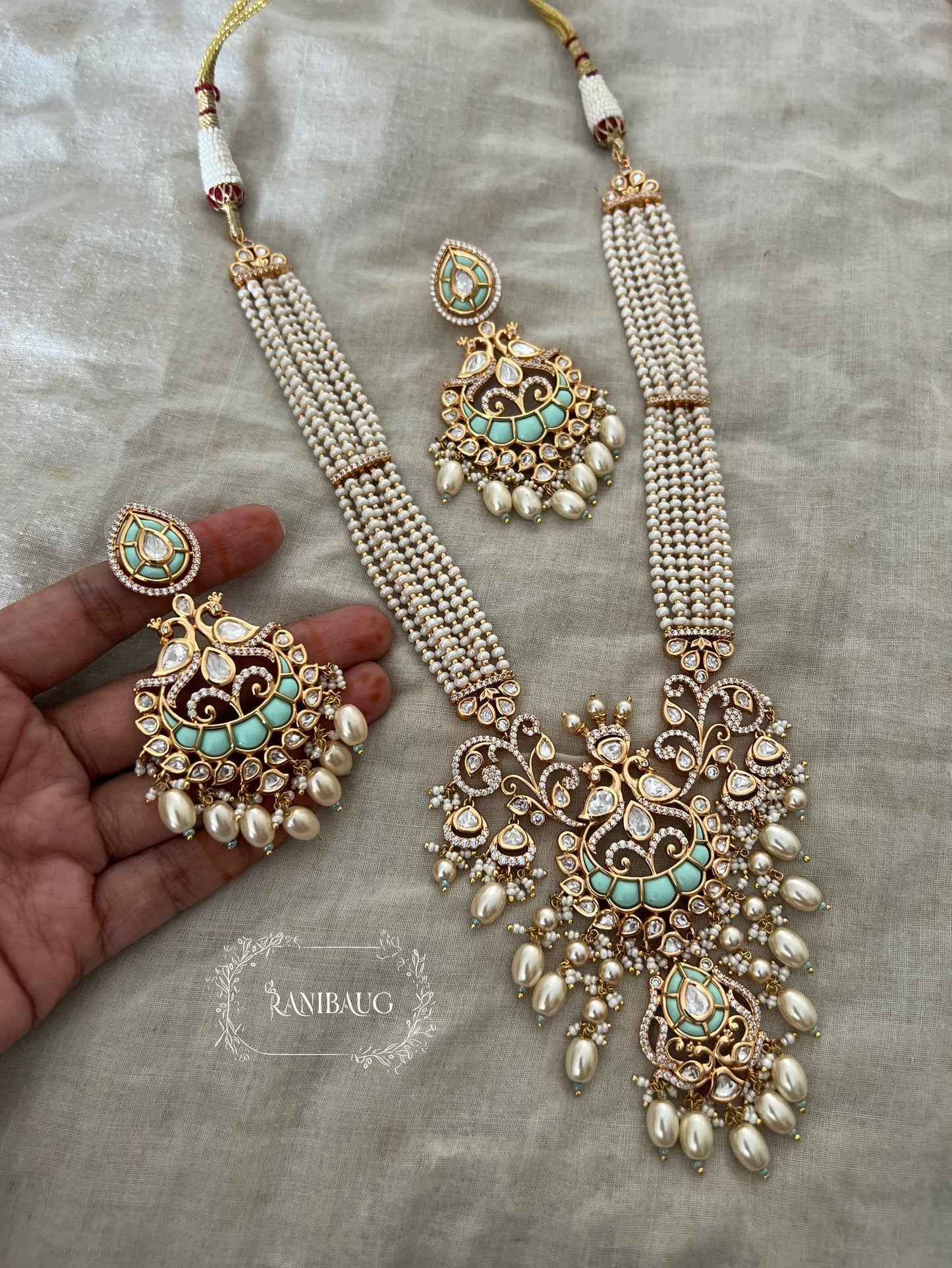 Avanti Royal Peacock Motif Pearl Adorned Polki Studded Gold Finish Princess Inspired Necklace Jewelry Set By Ranibaug
