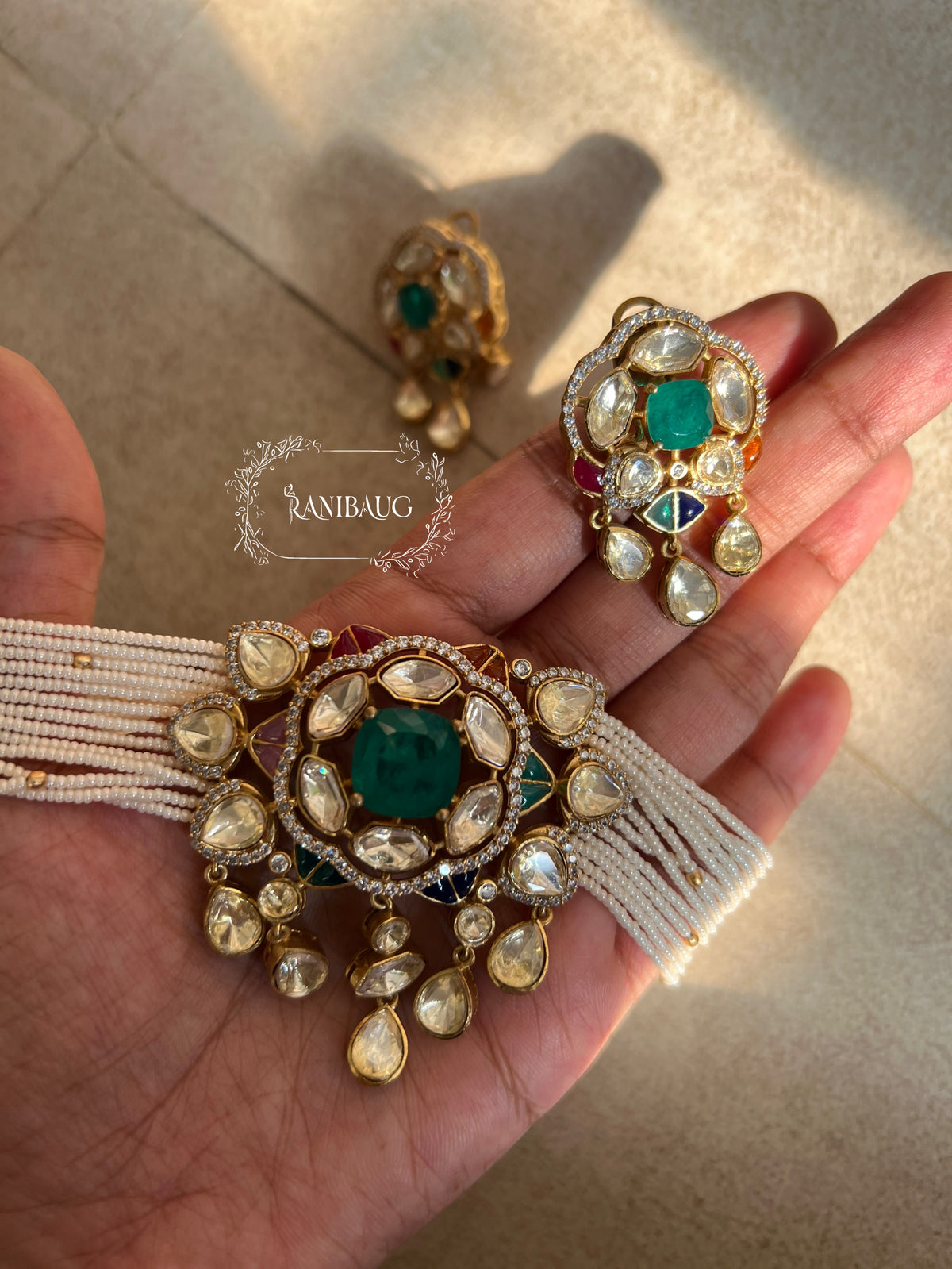 Avantika Emerald Mossainite Gold Finish Ssed Pearl Strand Statement Choker Set By Ranibaug