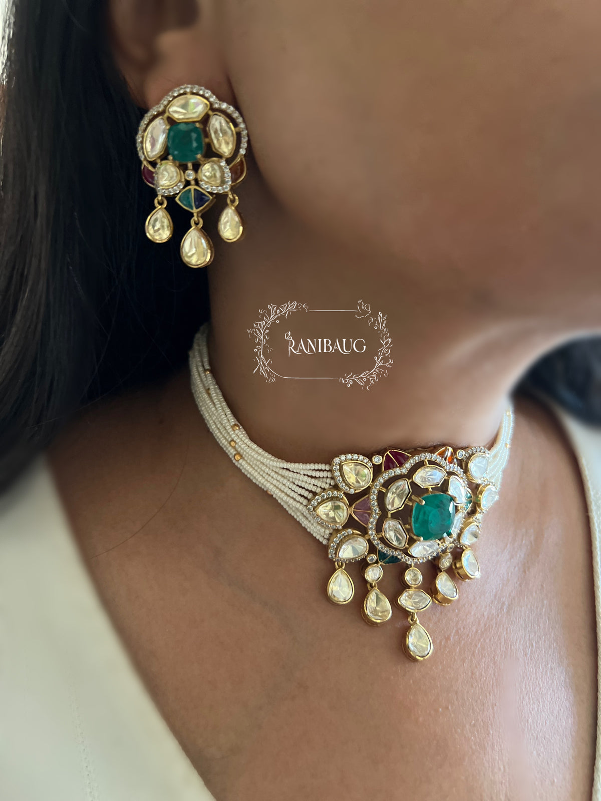 Avantika Emerald Mossainite Gold Finish Ssed Pearl Strand Statement Choker Set By Ranibaug