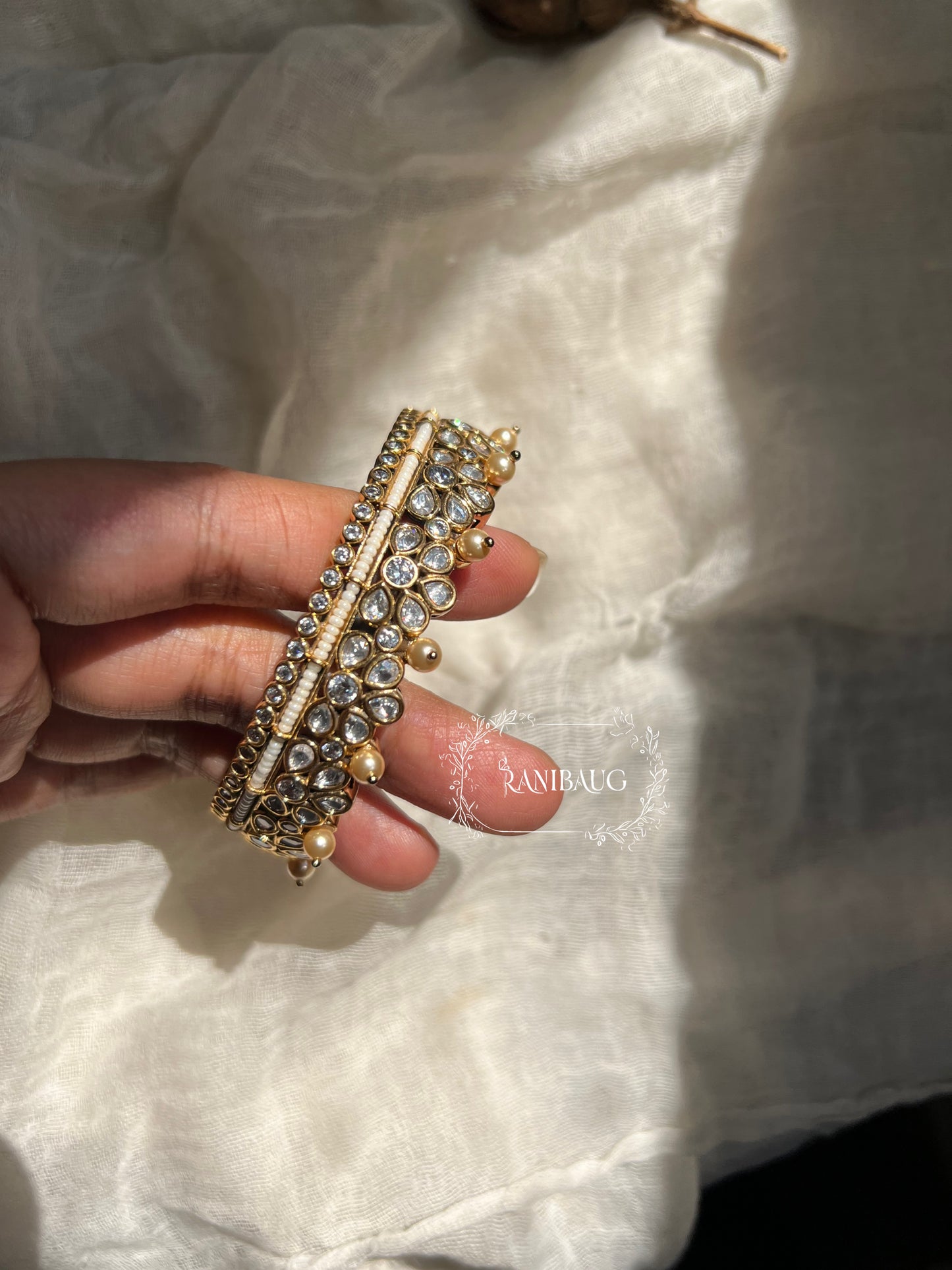 Avika Antique White Pearl Mossainite Statement Bangles By Ranibaug