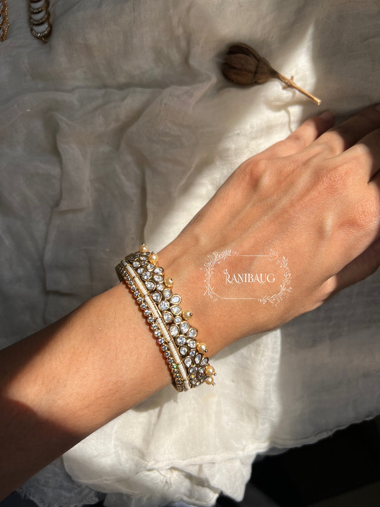 Avika Antique White Pearl Mossainite Statement Bangles By Ranibaug