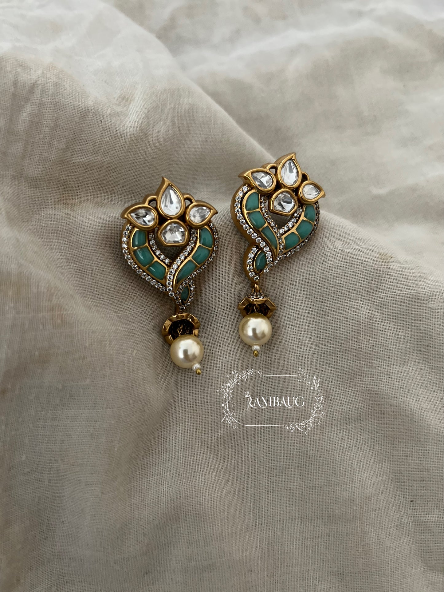 Avira Polki Kundan Enamel Gold Finish Designer Festive Ear Studs With Pearl Dangle By Ranibaug