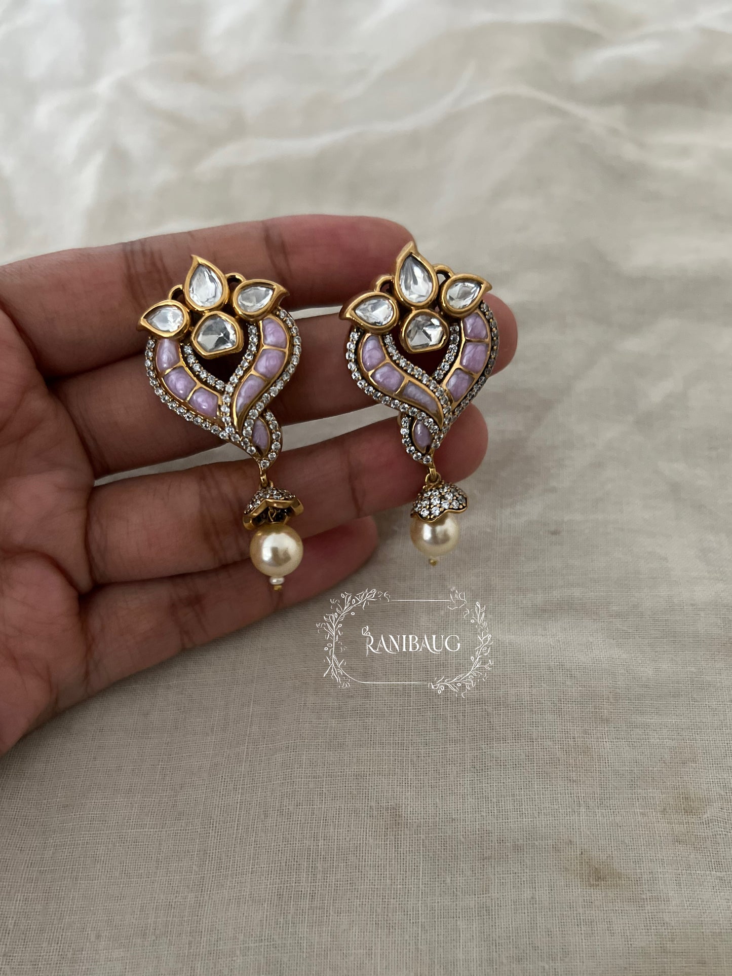 Avira Polki Kundan Enamel Gold Finish Designer Festive Ear Studs With Pearl Dangle By Ranibaug