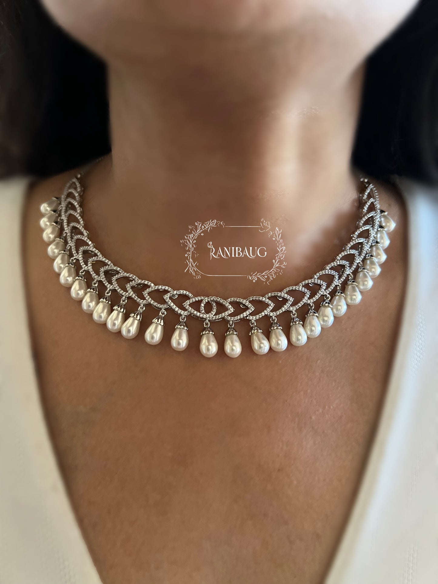 Avni Pearl Adorned Diamond Structured Necklace Set By Ranibaug