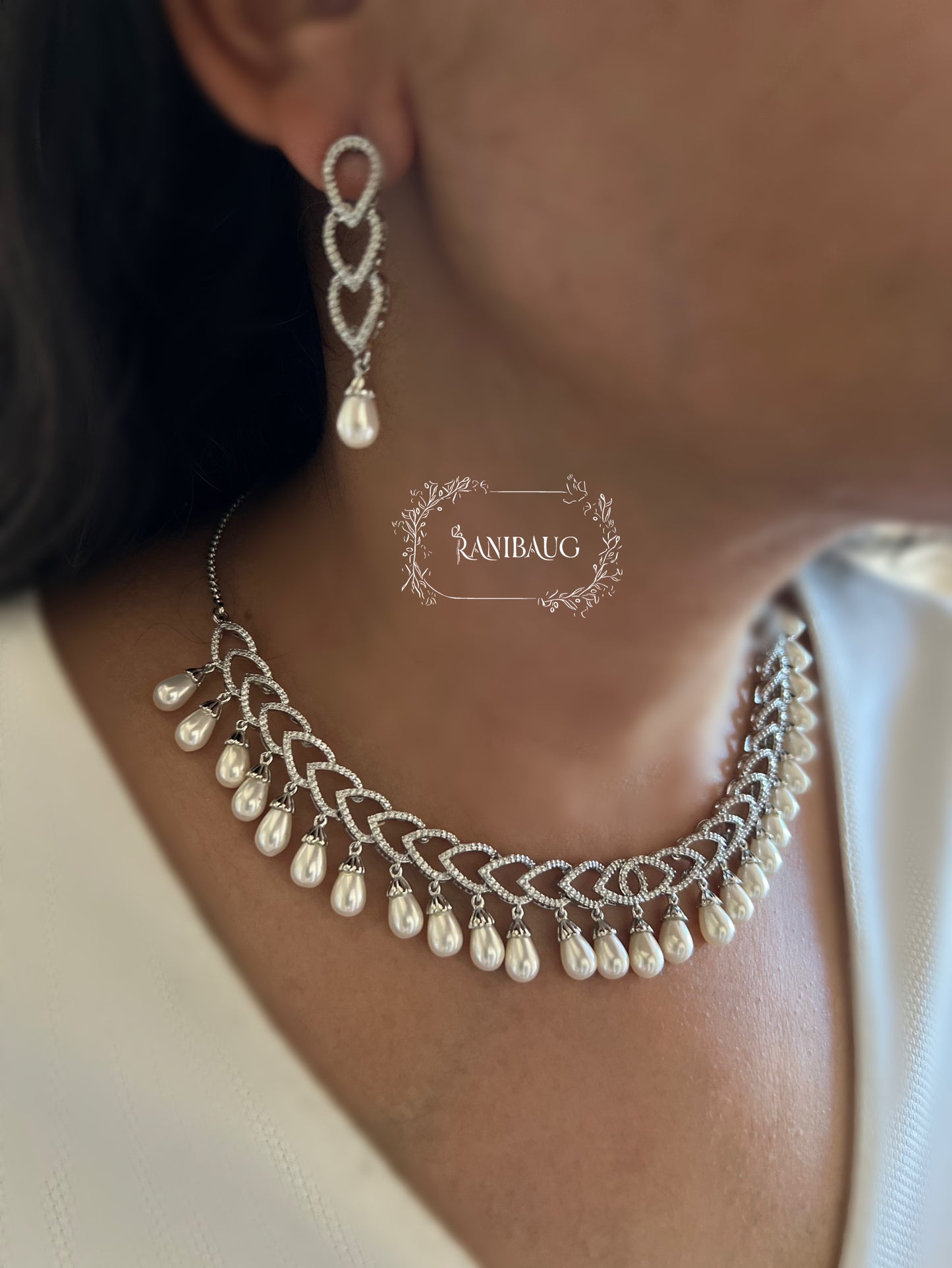 Avni Pearl Adorned Diamond Structured Necklace Set By Ranibaug