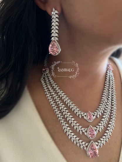 Bansi Layered Designer Diamond Necklace Jewelry Set By Ranibaug Adorned With Emerald And Pink Teardrop Stones