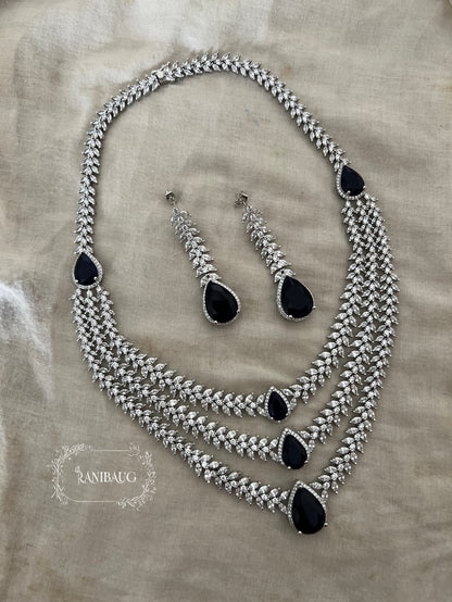 Bansi Layered Designer Diamond Necklace Jewelry Set By Ranibaug Adorned With Emerald And Pink Teardrop Stones