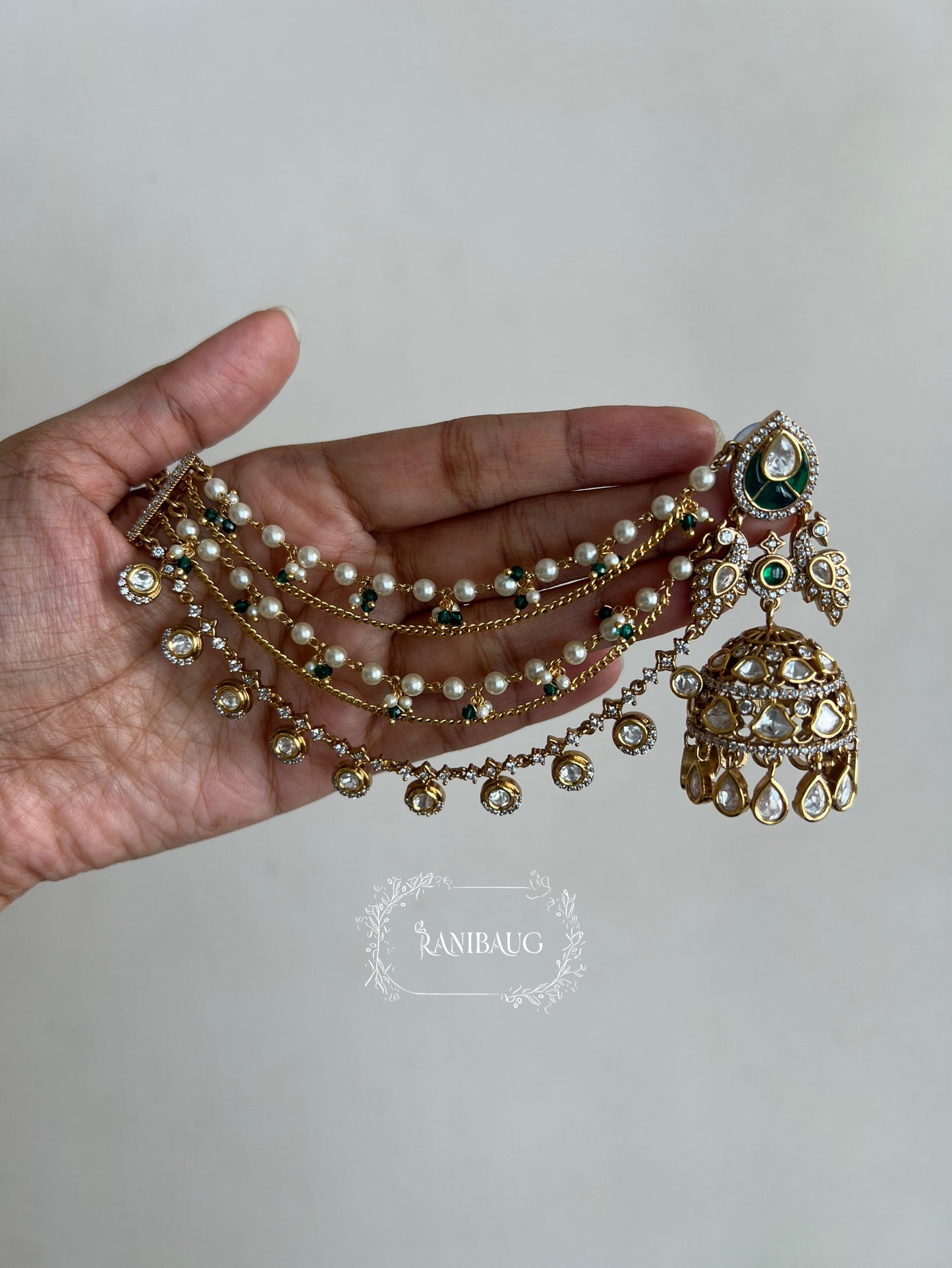 Bharti Peacock Motif Bahubali Jhumka With Hair Chain | Gold Plated Polki Kundan Hair And Ear Jewelry By Ranibaug | 2026 Jewelry Trends