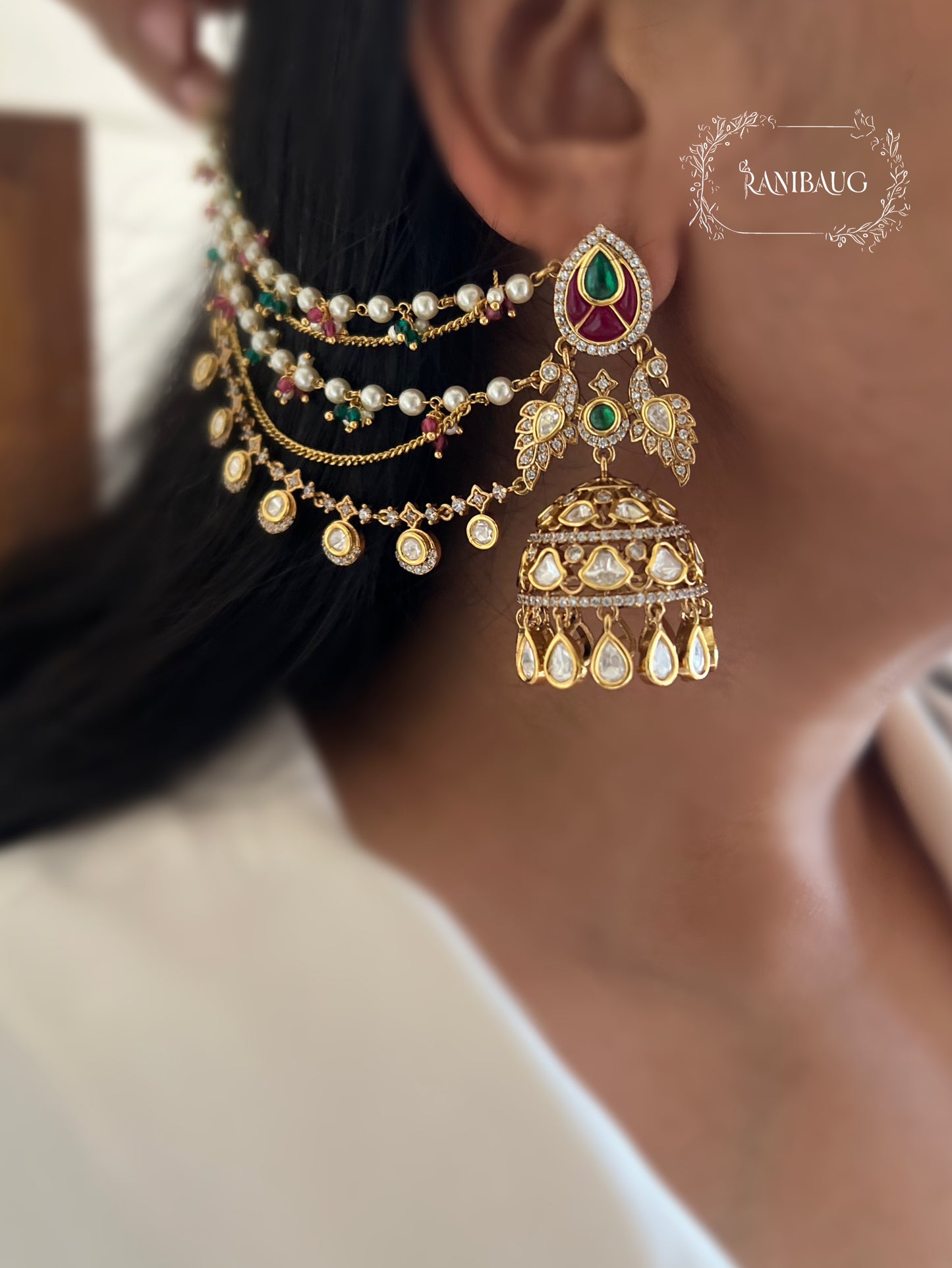 Bharti Peacock Motif Bahubali Jhumka With Hair Chain | Gold Plated Polki Kundan Hair And Ear Jewelry By Ranibaug | 2026 Jewelry Trends
