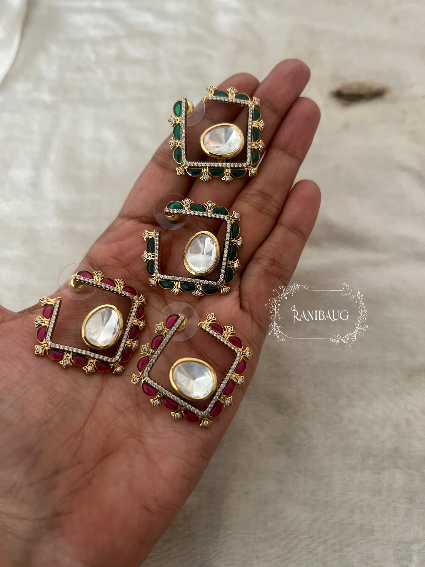 Chaarvi Square Stud Earrings Featuring Polki Center Stone In Premium Gold Plating By Ranibaug | Trendy Ear Stud Earrings
