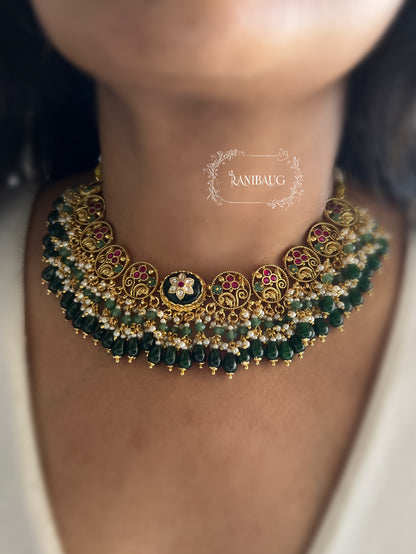 Chavvi Deep Emerald Green Floral Motif Beaded And Pearl Adorned Premium Gold Finish Unique Designer Heritage Set By Ranibaug