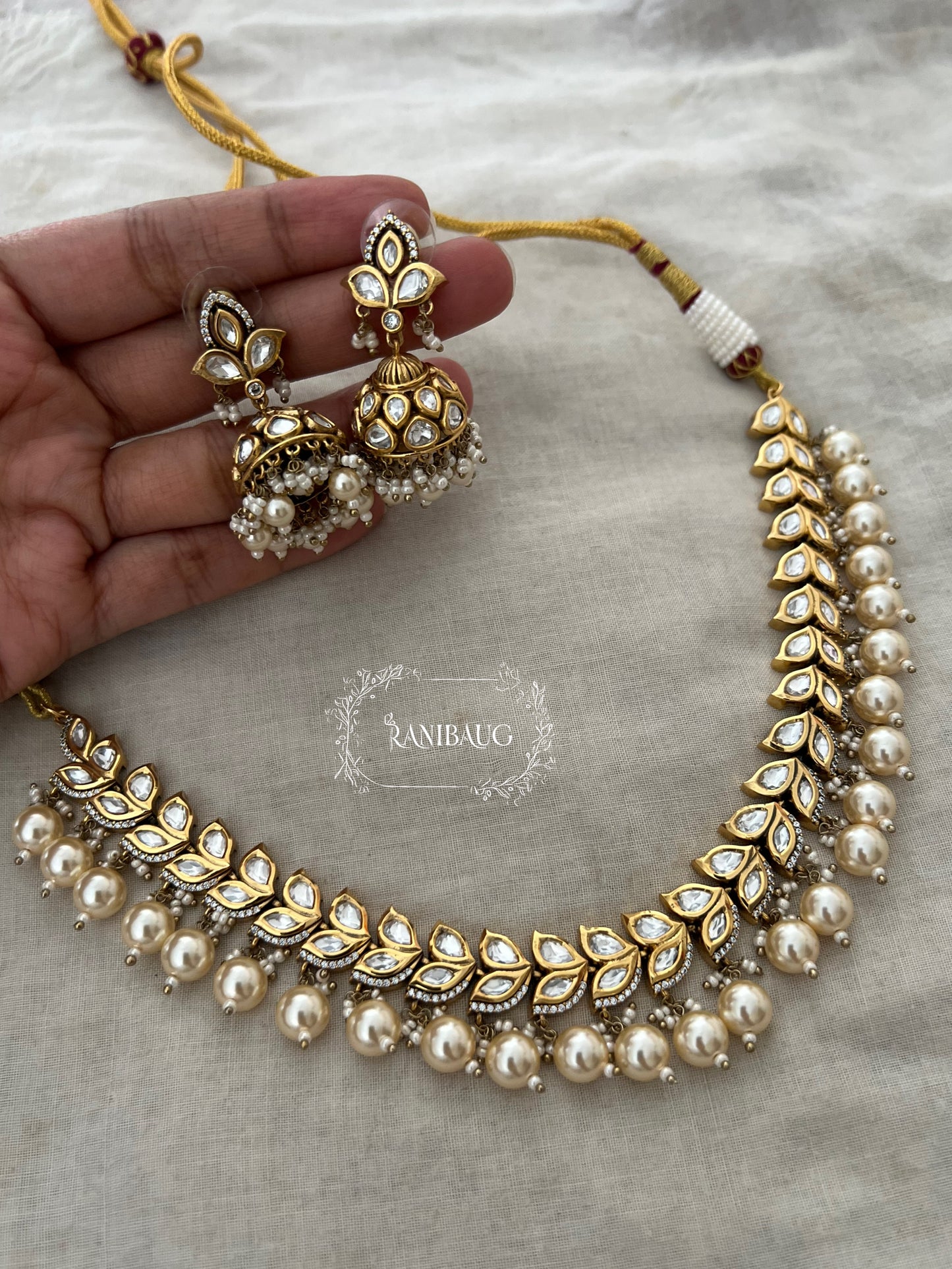 Chaya Leaf Kundan And Pearl Necklace Set In Rich Gold Finish By Ranibaug | Wedding Necklace Jewelry