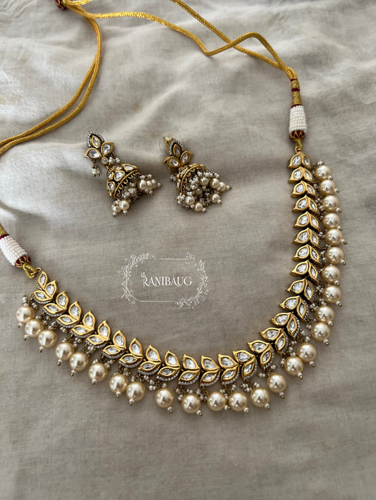 Chaya Leaf Kundan And Pearl Necklace Set In Rich Gold Finish By Ranibaug | Wedding Necklace Jewelry