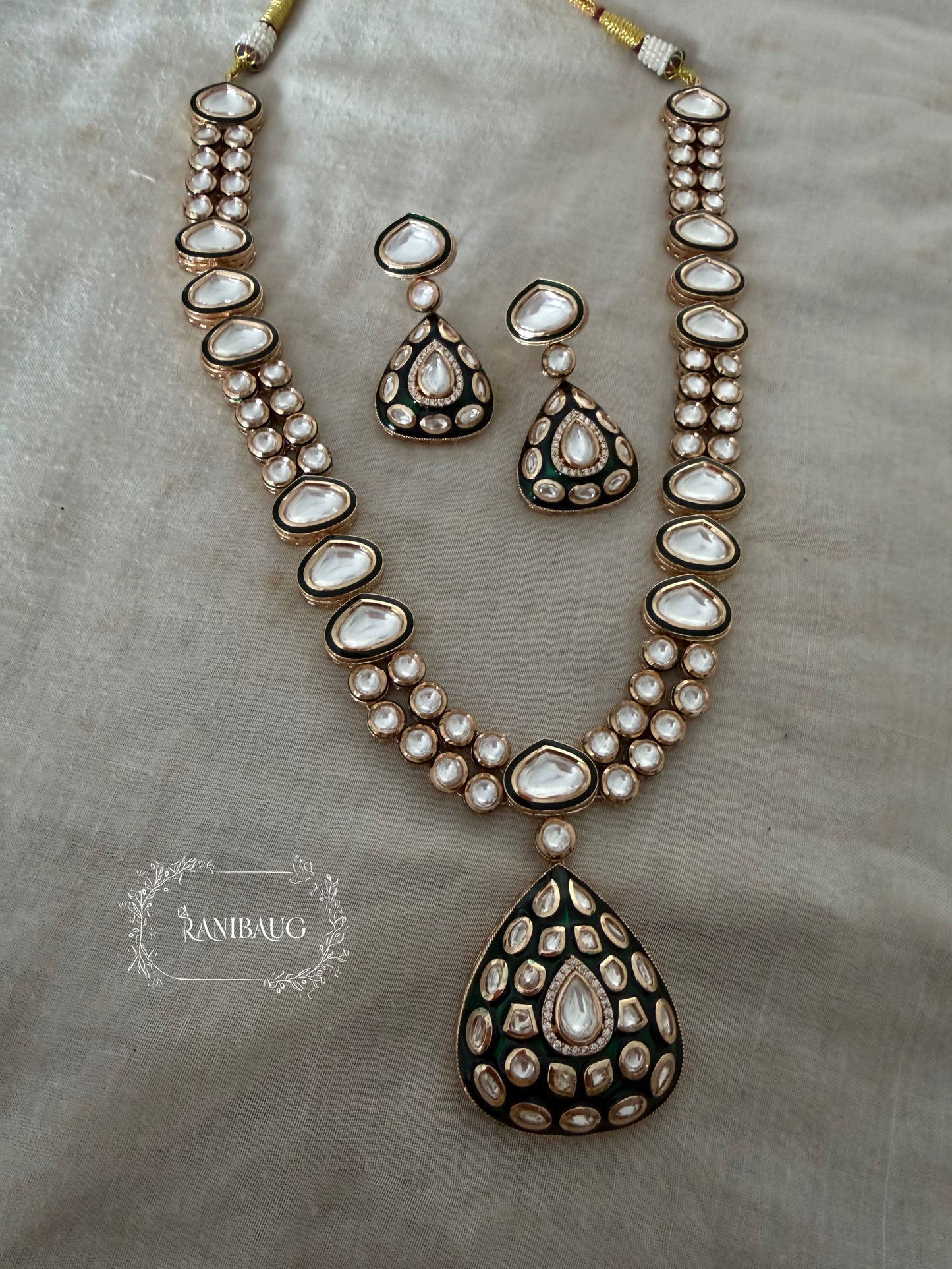 Chitra Teardrop Motif Mossainite Polki Matt Gold Finish Necklace Set By Ranibaug