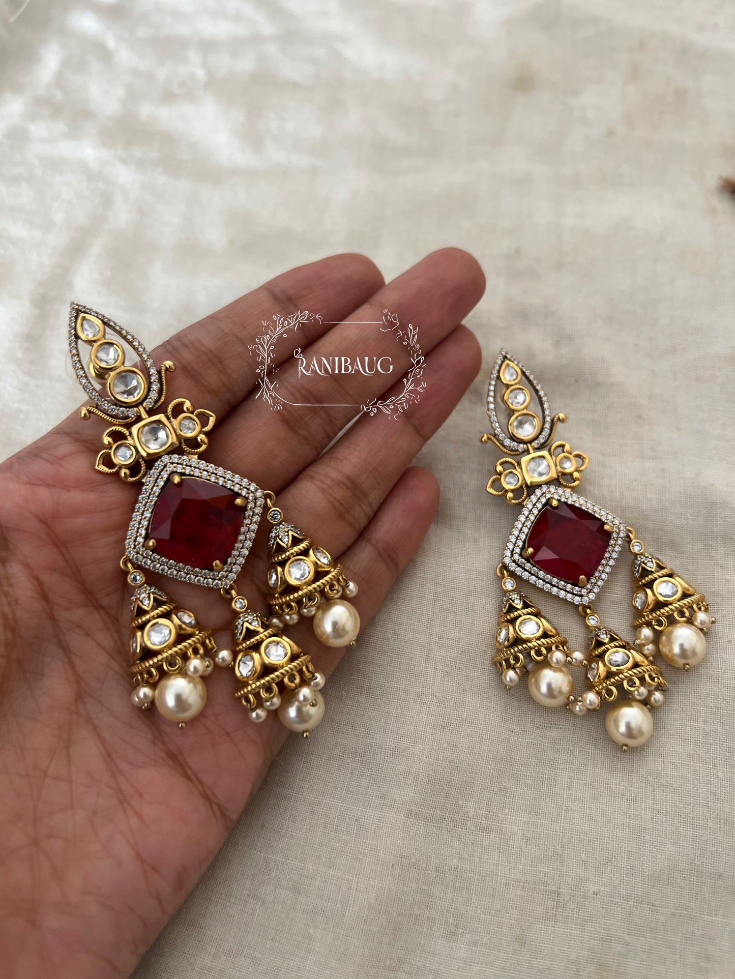 Darshini Gold Plated Pearl Dangler Earrings By Ranibaug