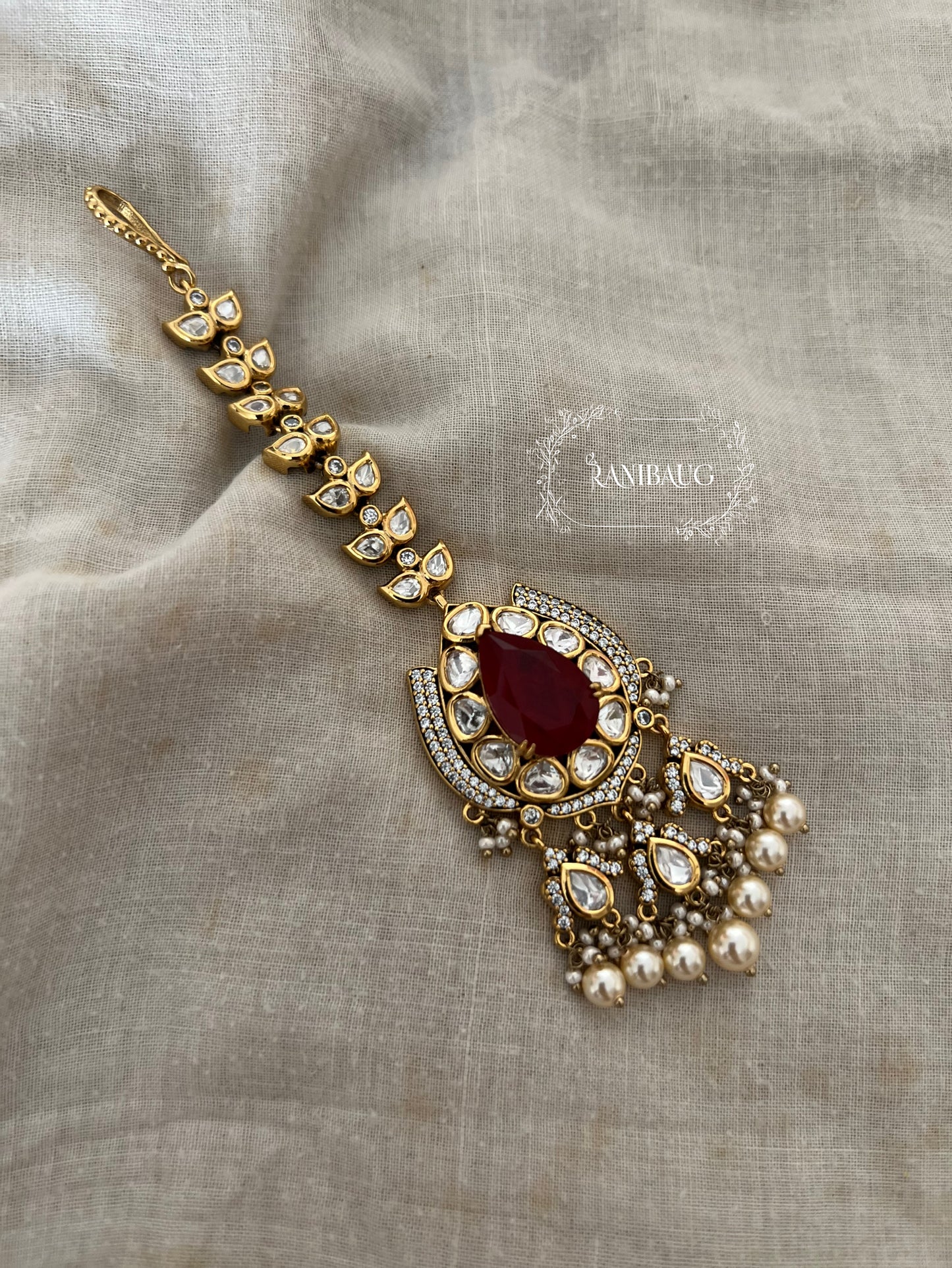 Deepika Indian Gemstone Polki Kundan Pearl Clusters Maang Tikka In Rich Gold Tone By Ranibaug | Hair Jewellery 2026