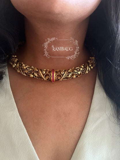 Deepti Hasli Antique Gold Finish Unique Neck Piece Jewelry Set With Intricate Floral Work By Ranibaug