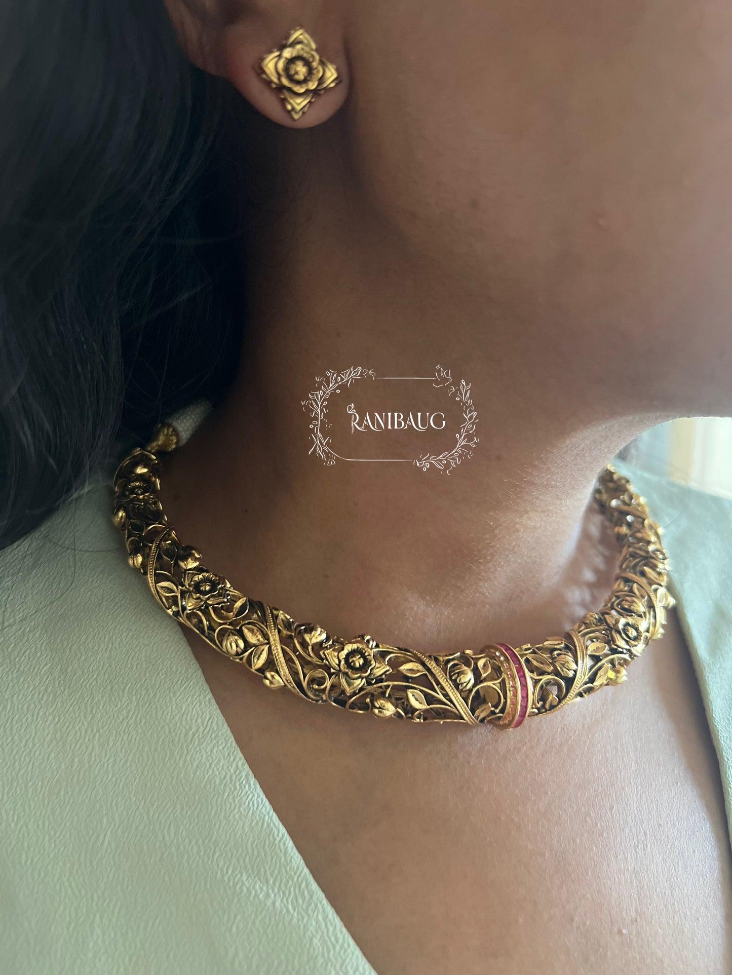 Deepti Hasli Antique Gold Finish Unique Neck Piece Jewelry Set With Intricate Floral Work By Ranibaug