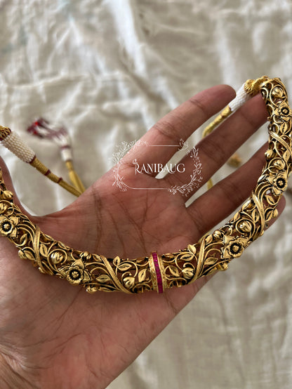 Deepti Hasli Antique Gold Finish Unique Neck Piece Jewelry Set With Intricate Floral Work By Ranibaug