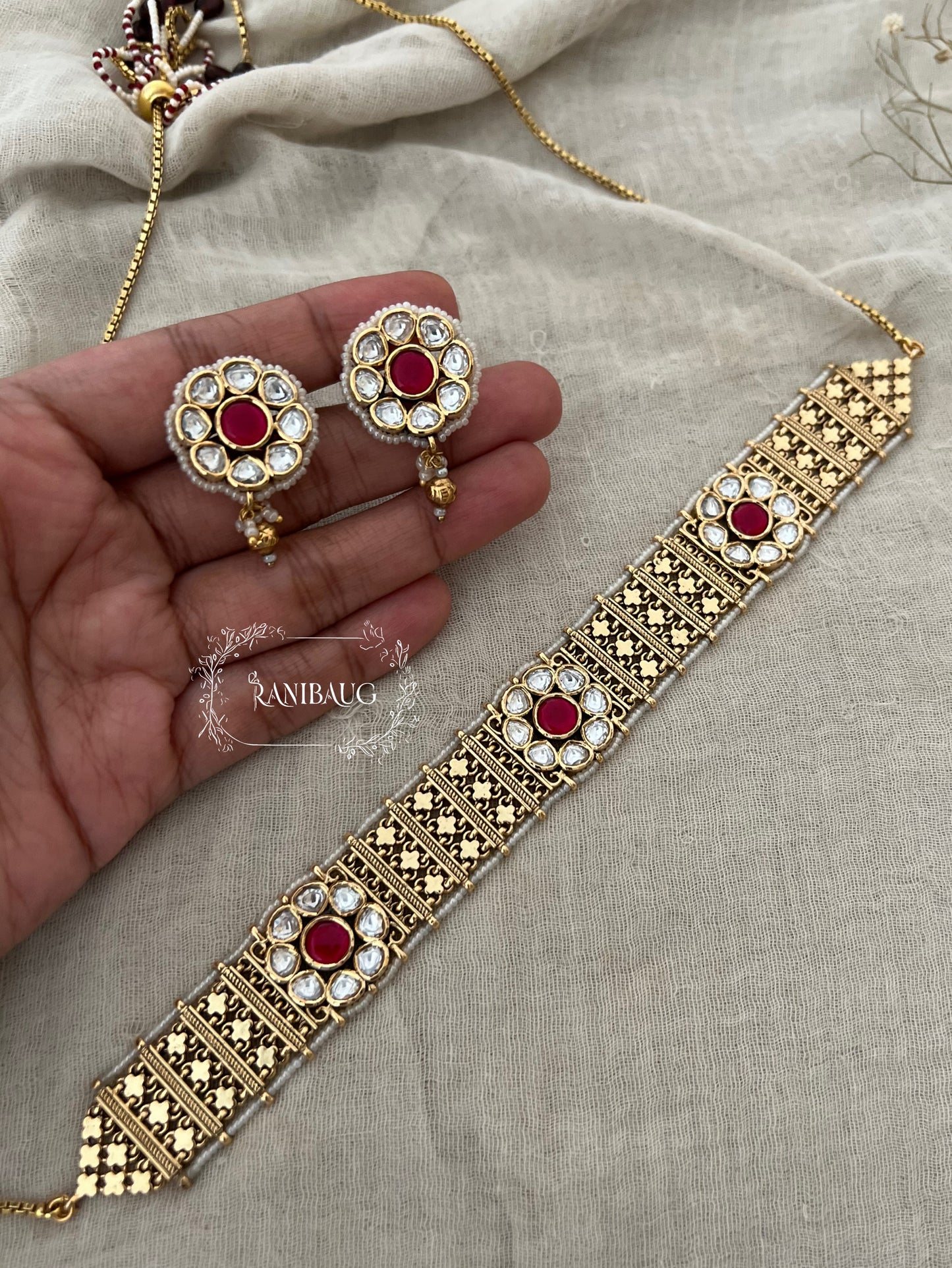 Devika Floral Motif Kundan Detailed Intricate Choker Set In Rich Gold Tone By Ranibaug | Heritage Temple Jewellery Set 2026