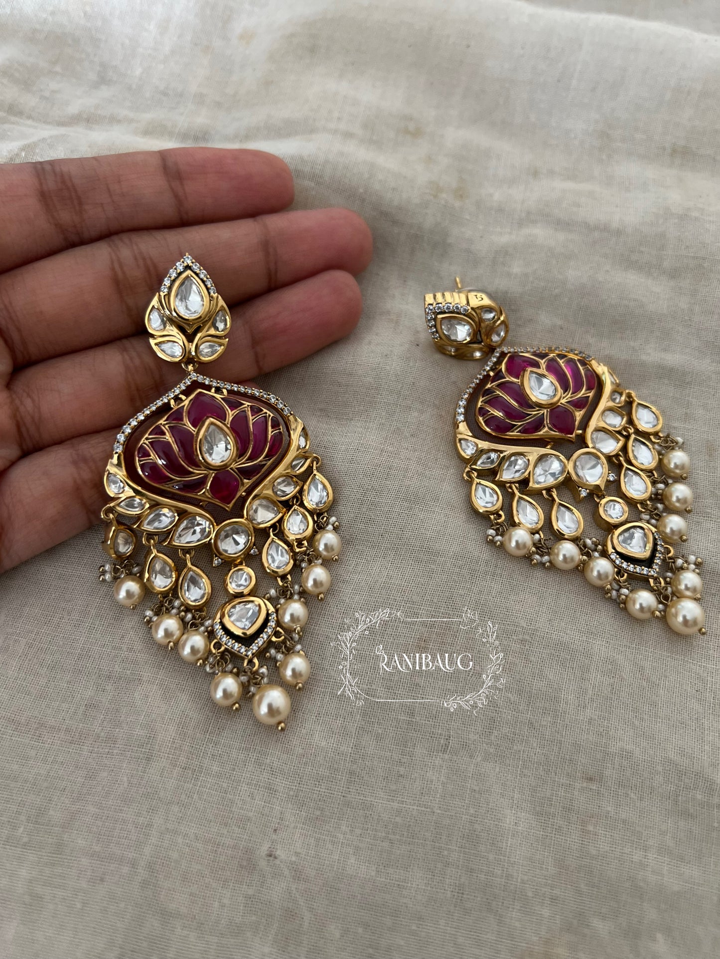 Devika Lotus Motif Emerald Green Color Polki Studded Rich Gold Finish Pearl Dangler Earrings By Ranibaug