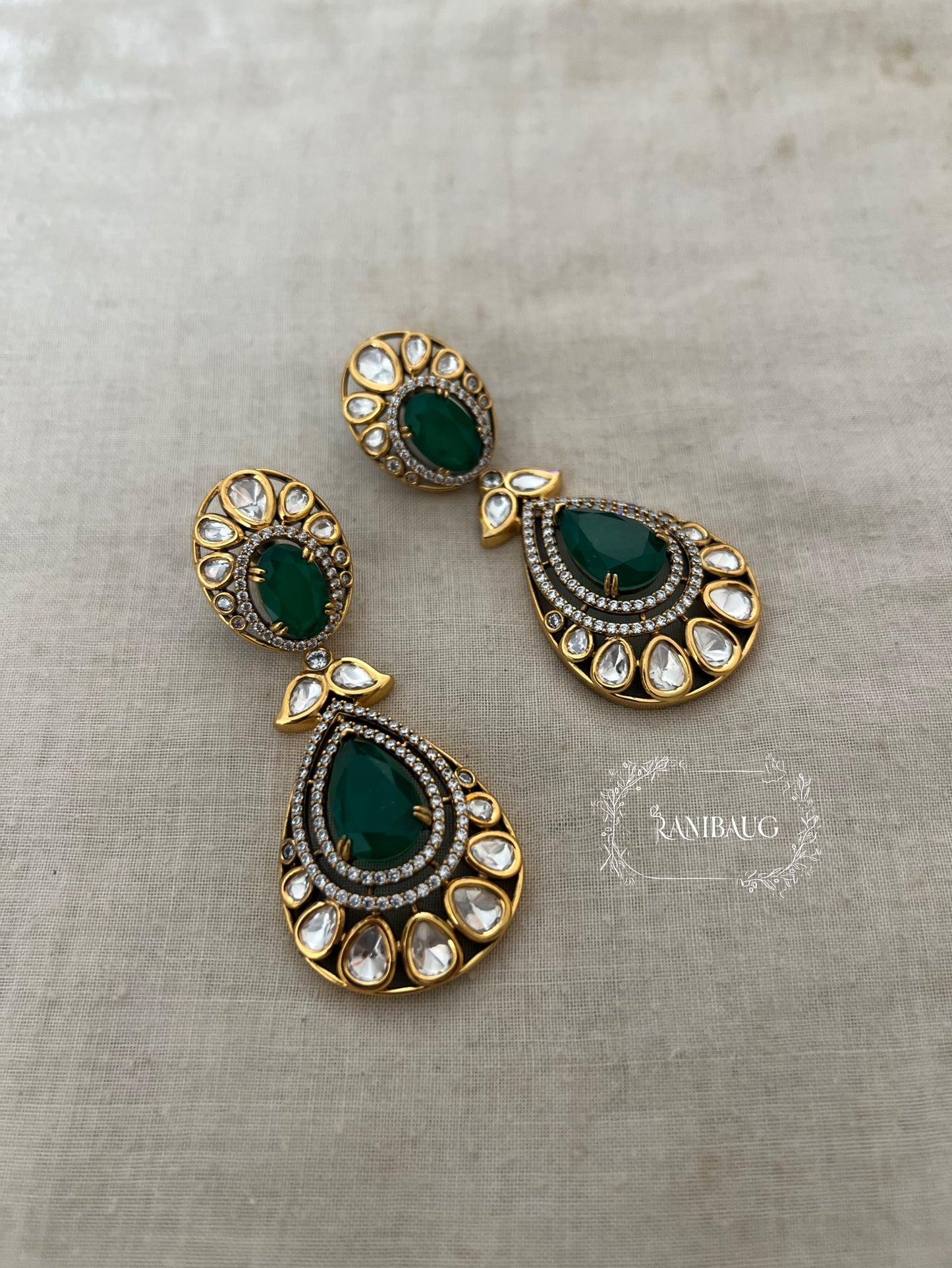 Disha Teardrop Gemstone And Polki Studded Antique Gold Finish Earrings By Ranibaug