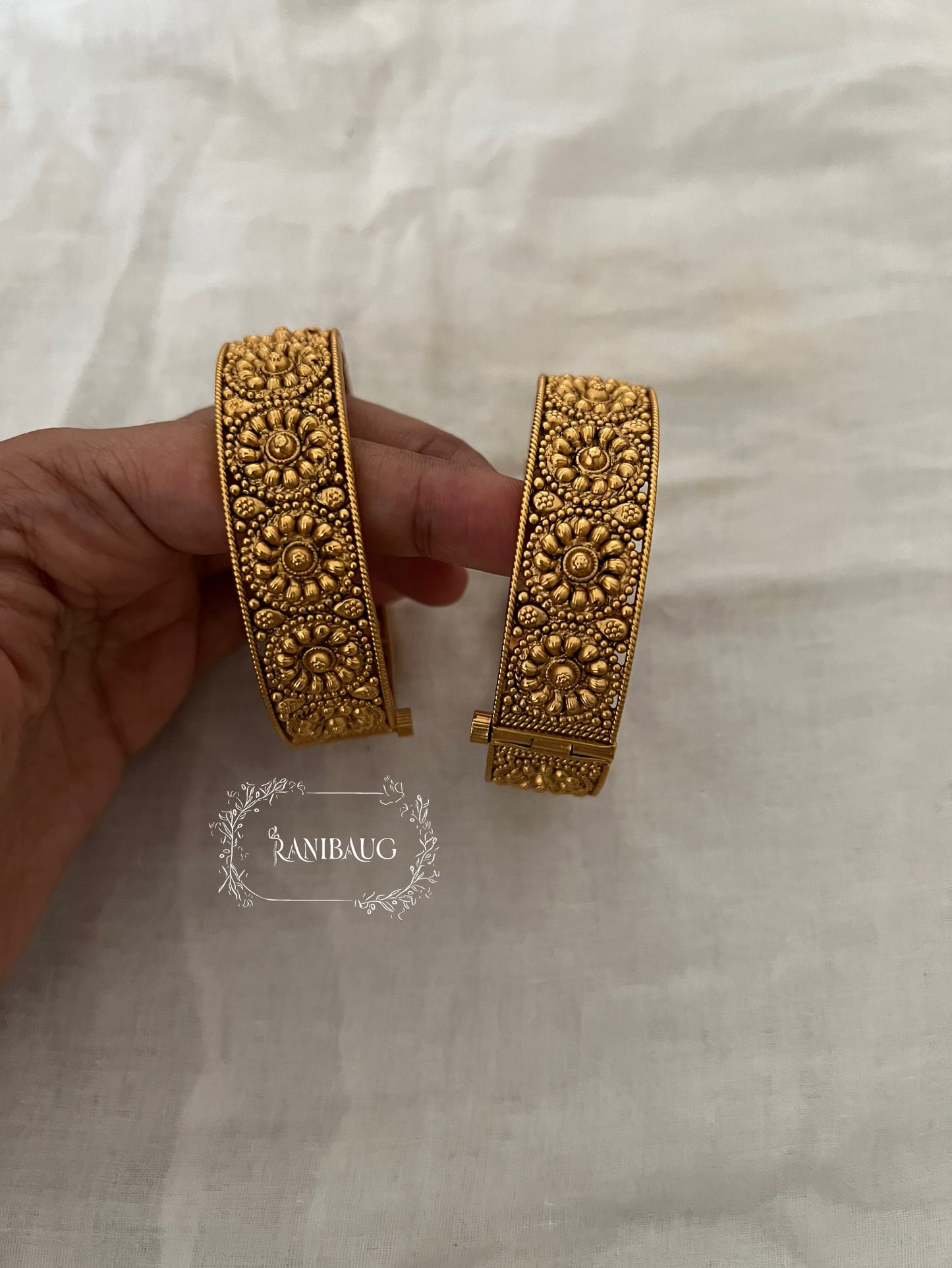 Diya Temple Carved Gold Finish Floral Designer Heritage Bangles By Ranibaug