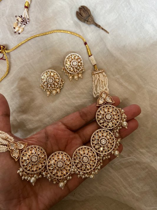 Ekta Gold Plated Mossainite Stones Set In Rich Pearl Bead Tassels Necklace Jewellery Set By Ranibaug