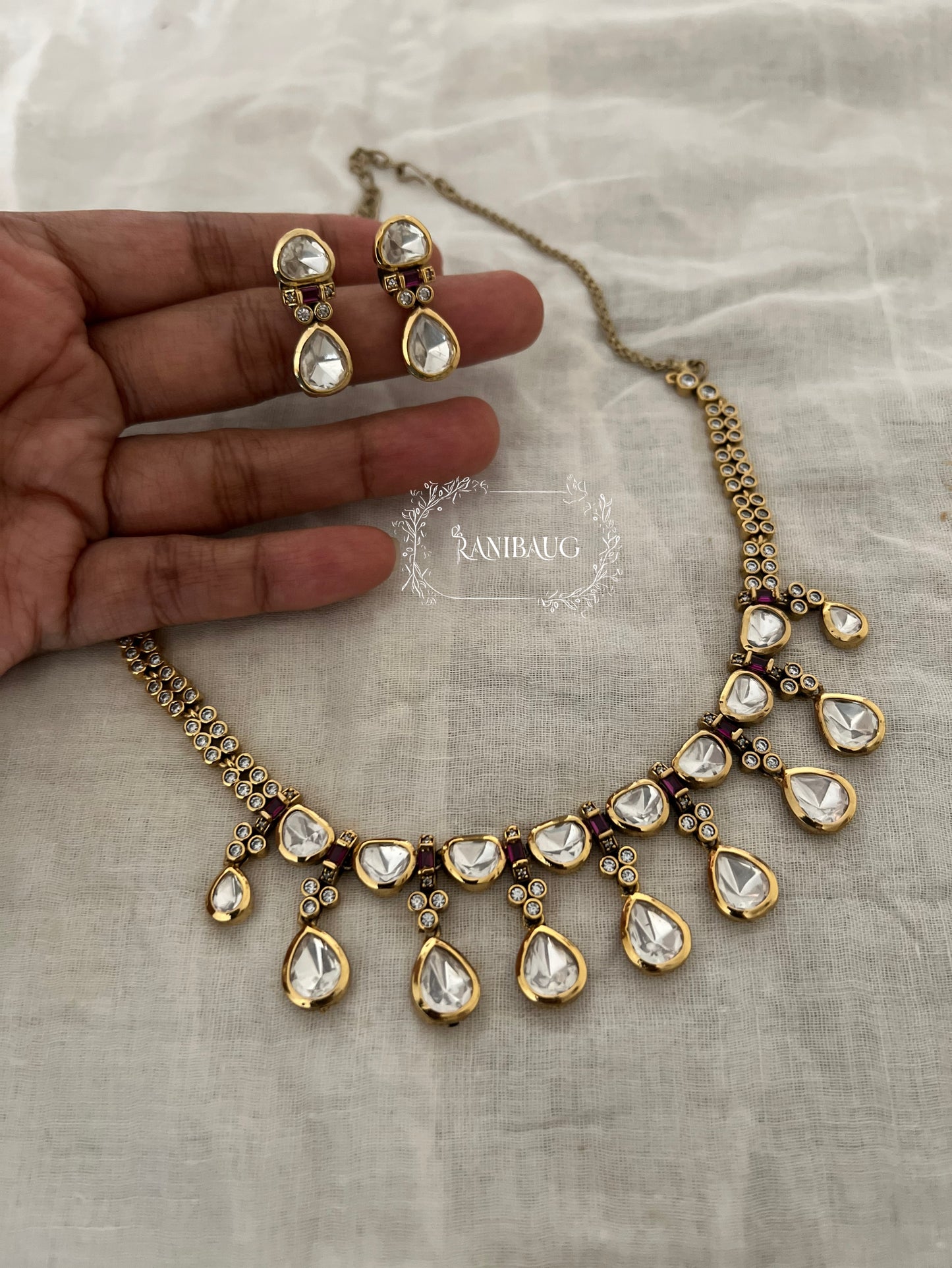 Enara Polki Kundan Gold Finish Teardrop Dangle Motif Necklace Set By Ranibaug
