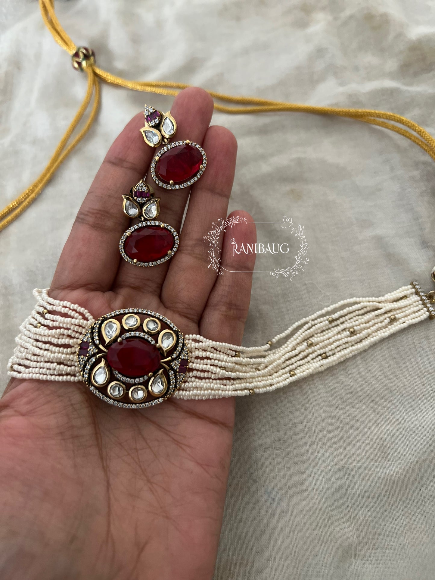 Eshana Royal Pearl Strand Kundan Polki Choker Set By Ranibaug