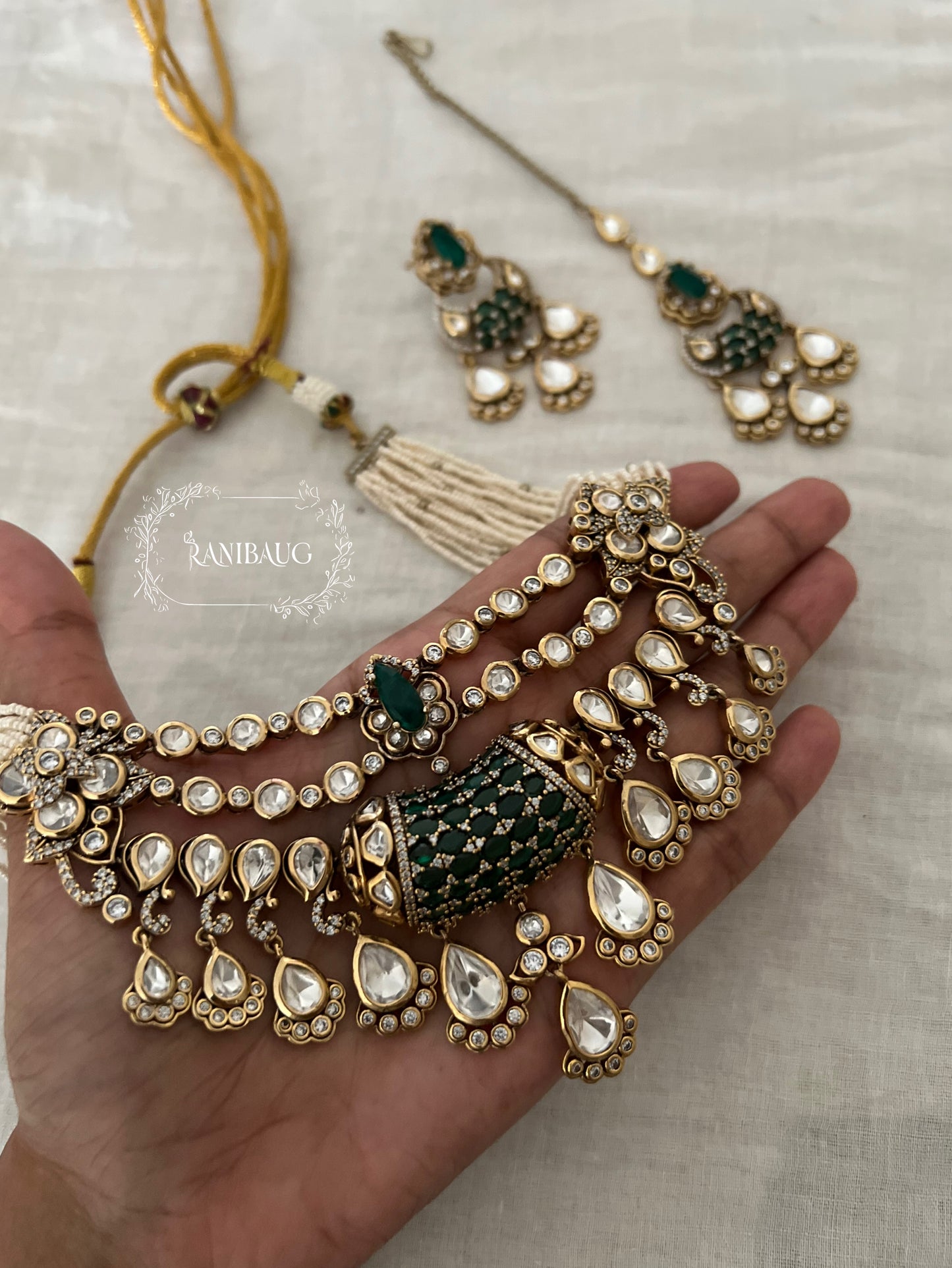 Eshani Emerald Silhouette Layered Polki Festive Jewelry Set With Maang Tikka By Ranibaug | The Royal Wedding Collection 2026