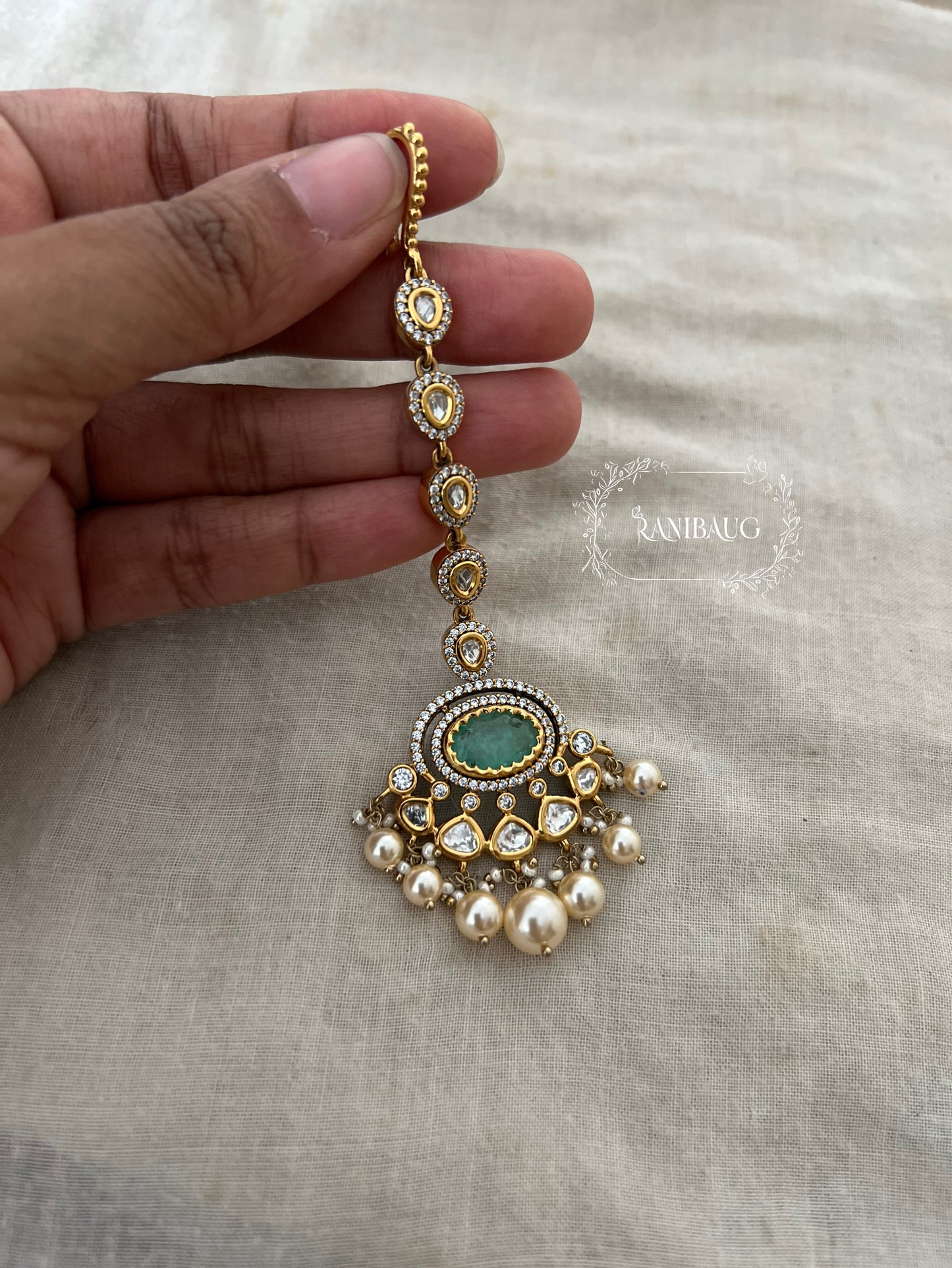 Gautami Rich Gold Tone Polki Studded Green Maangtikka With Pearl By Ranibaug