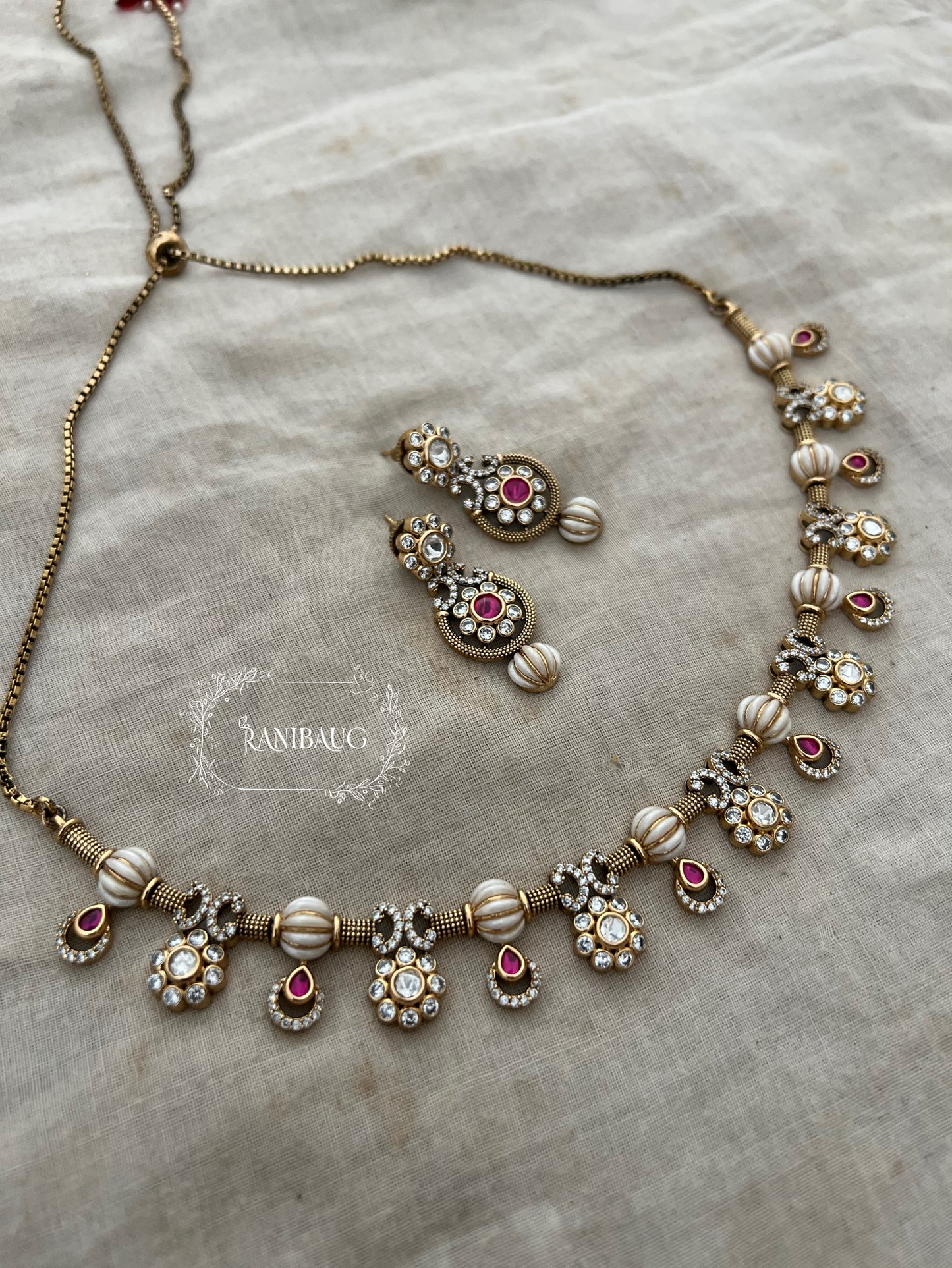 Girija Designer Beaded Motif Kundan Drops Gold Plated Necklace Set By Ranibaug