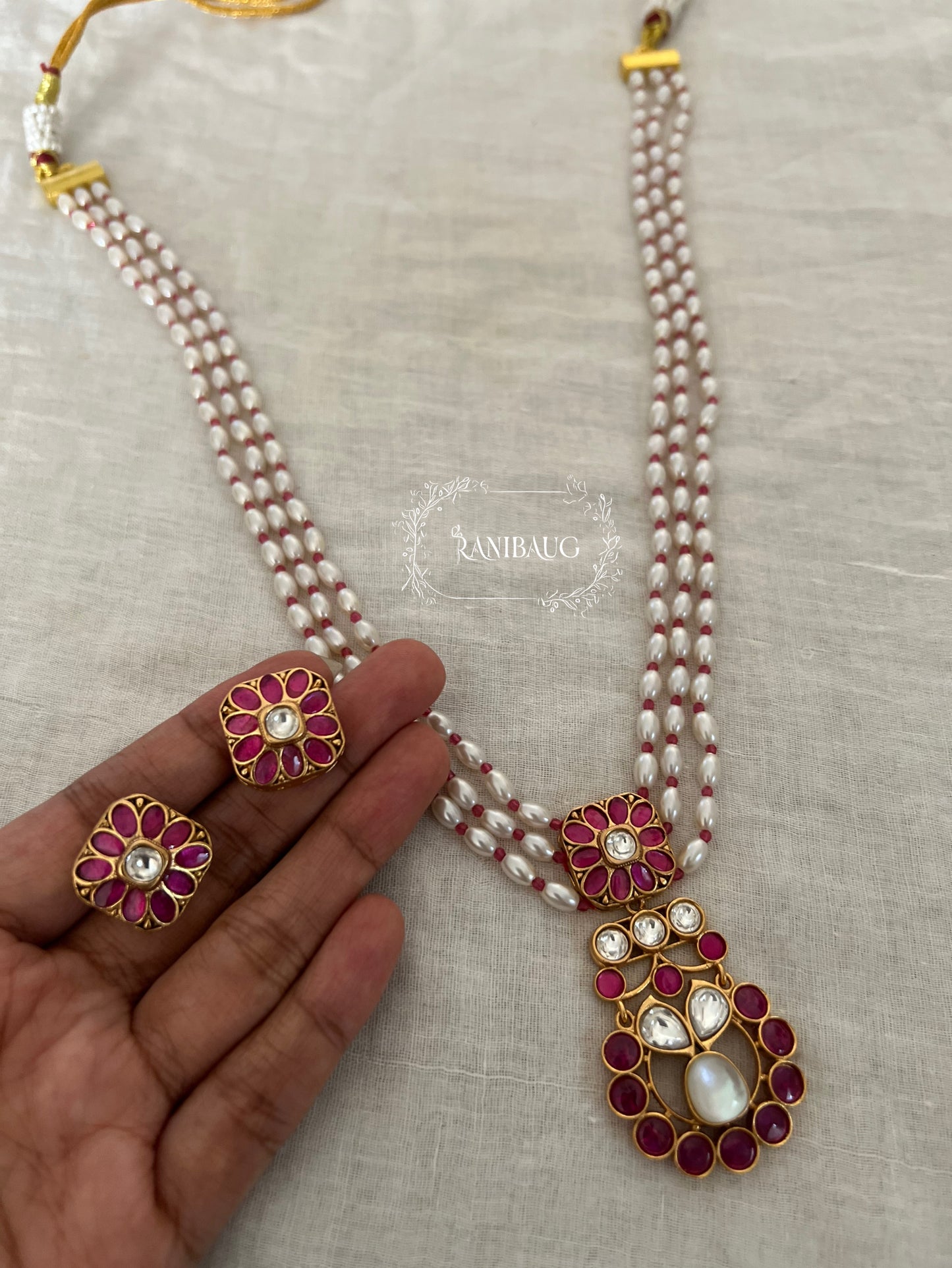 Guntaz Kundan Studded Gold Finish Pearl Strand Enamel Floral Motif Necklace Set By Ranibaug