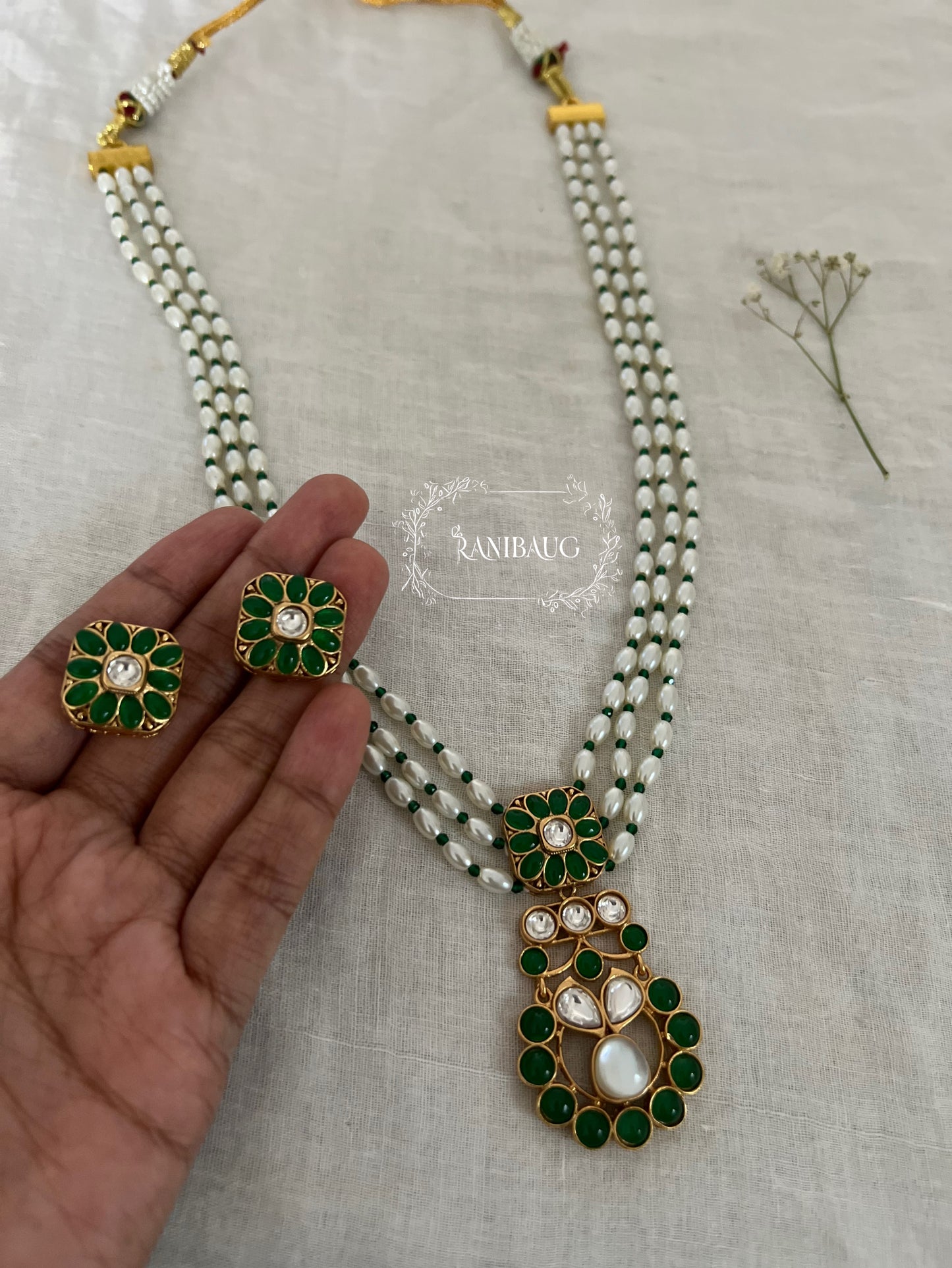 Guntaz Kundan Studded Gold Finish Pearl Strand Enamel Floral Motif Necklace Set By Ranibaug