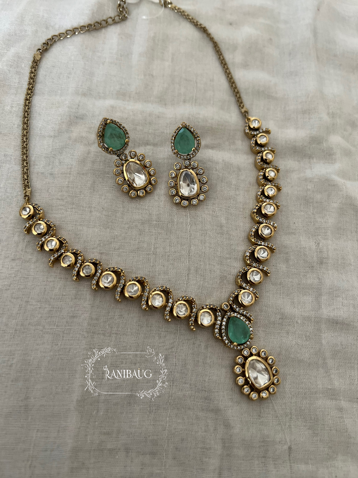Harshada Teardrop Polki Adorned Multi Color Festive Jewellery Set By Ranibaug