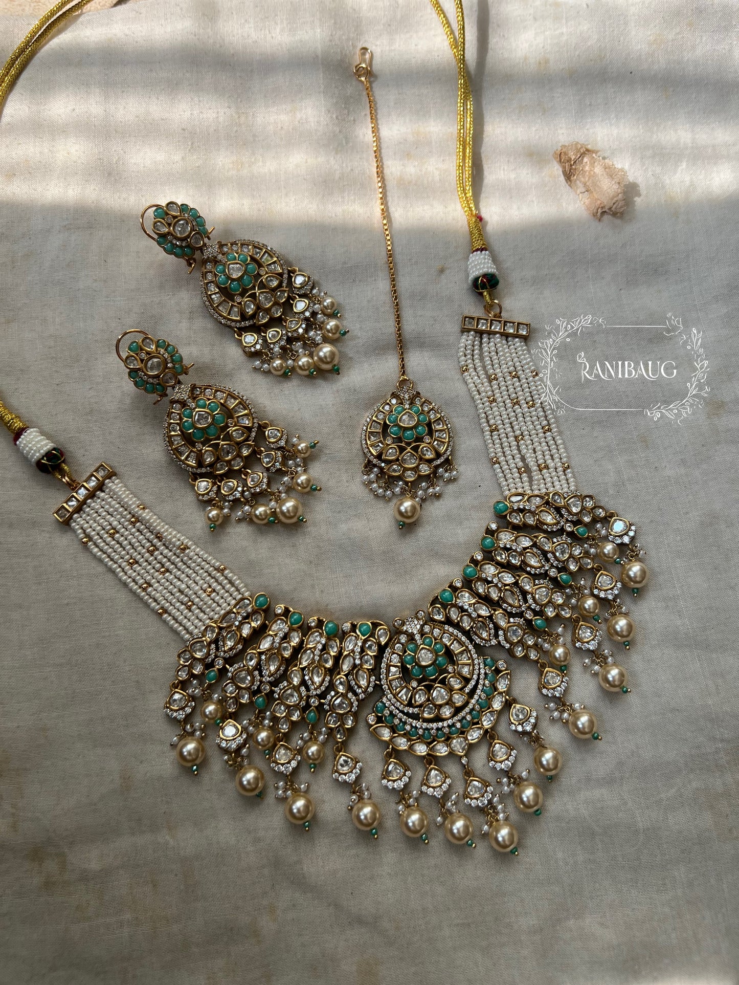 Harshi Pearl Mesh Polki Choker | Wide Collar With Greenish Blue Enamel Accents Jewelry Set With Maang Tikka By Ranibaug