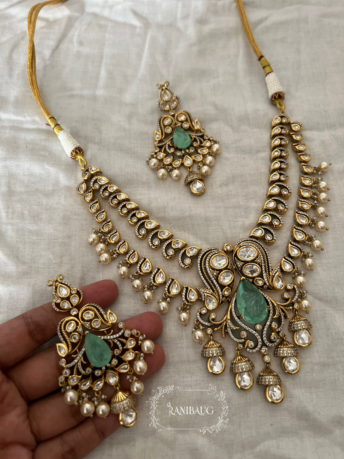 Harshika Emerald Multi Layered Designer Wedding Necklce By Ranibaug