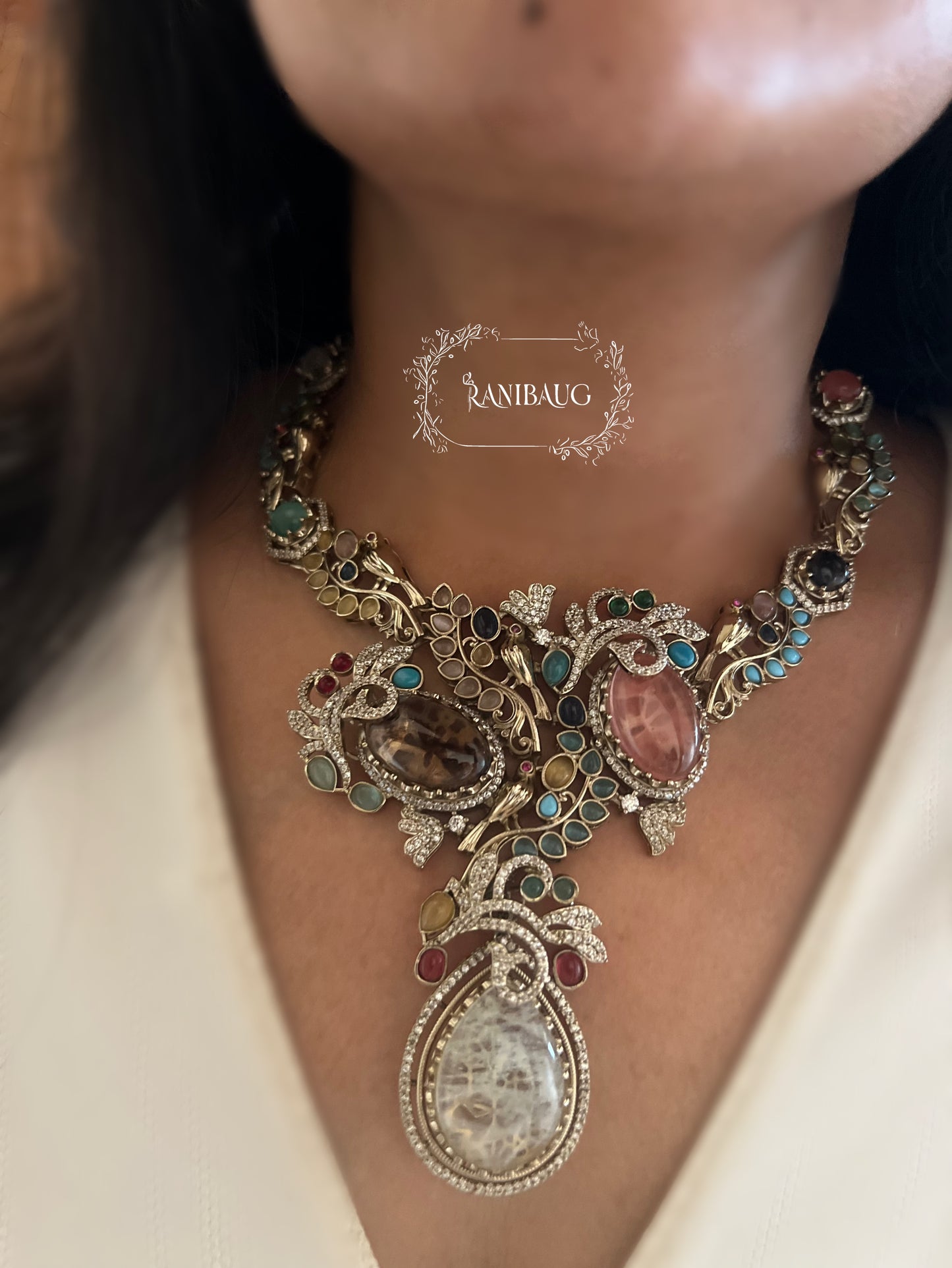 Sabya Multicolor Gemstone Kundan And Pearl Tejasvi Choker Jewellery Set In Antique Gold Finish By Ranibaug