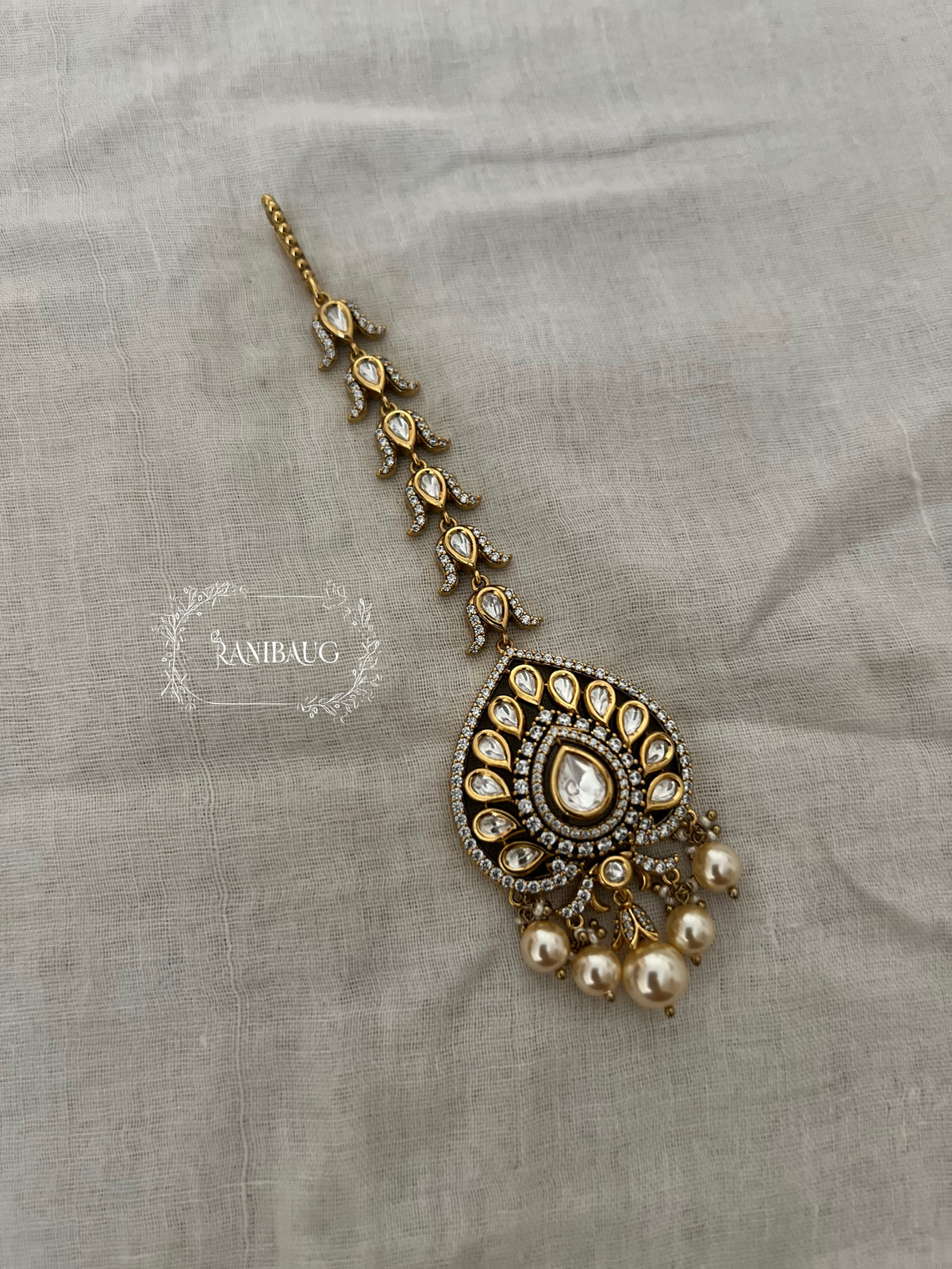 Richa Unique Moon Inspired Polki Kundan Studded Maangtikka In Premium Gold Finish By Ranibaug | Trendy Maang Tikka Jewellery For Wedding 2026