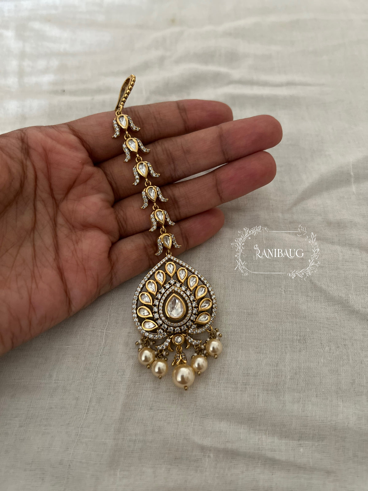 Richa Unique Moon Inspired Polki Kundan Studded Maangtikka In Premium Gold Finish By Ranibaug | Trendy Maang Tikka Jewellery For Wedding 2026