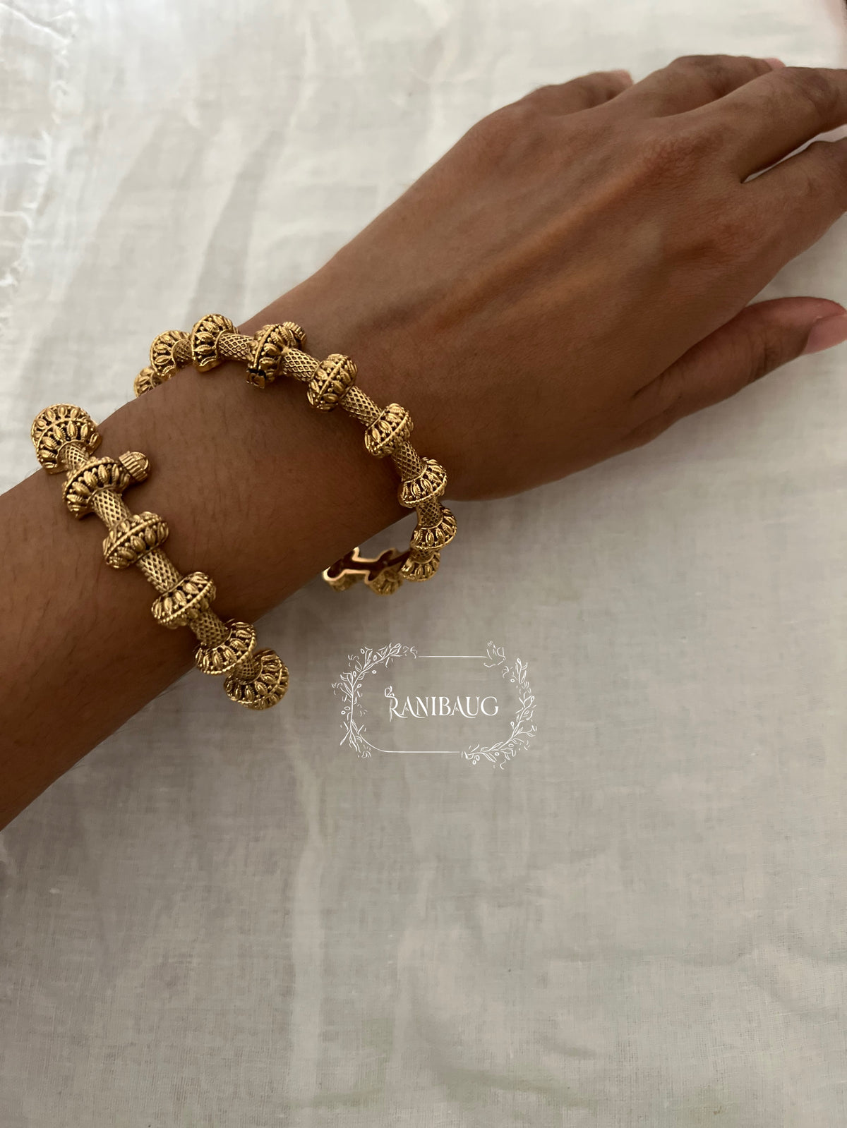 Shravya Unique Design Gold Charm Bangle By Ranibaug